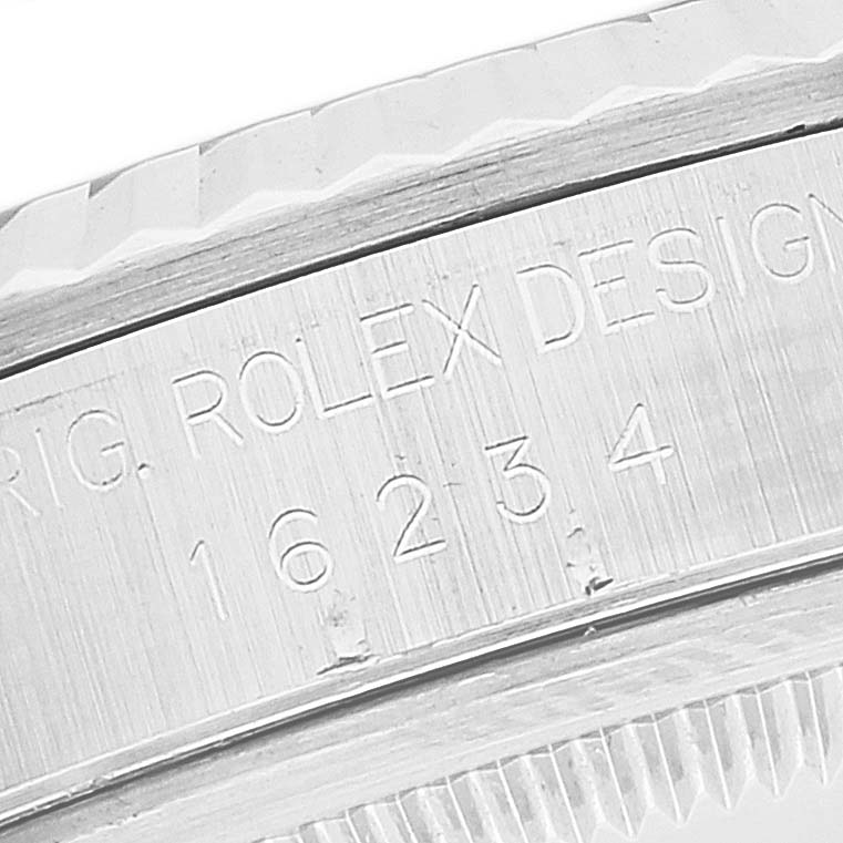 This close-up image shows the side engraving, including model number, on the case of a Rolex Datejust 16234 Men's Stainless Steel Blue Dial 16234 Men's Stainless Steel Blue Dial watch.