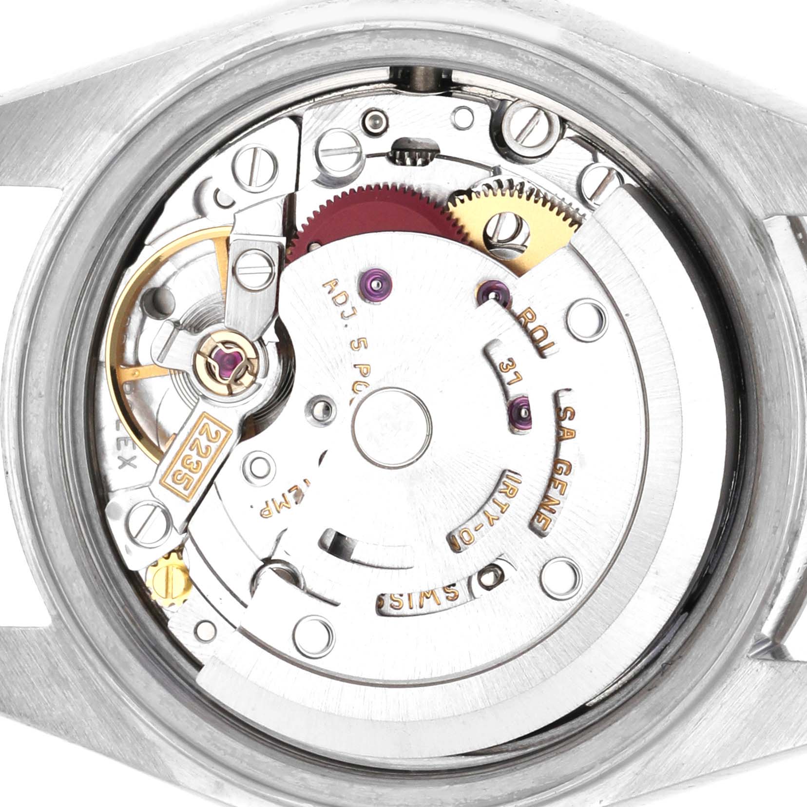The image shows the internal movement of a Rolex Datejust 79174 Women's Stainless Steel Black Dial 79174 Women's Stainless Steel Black Dial watch from a rear angle, highlighting gears and components.