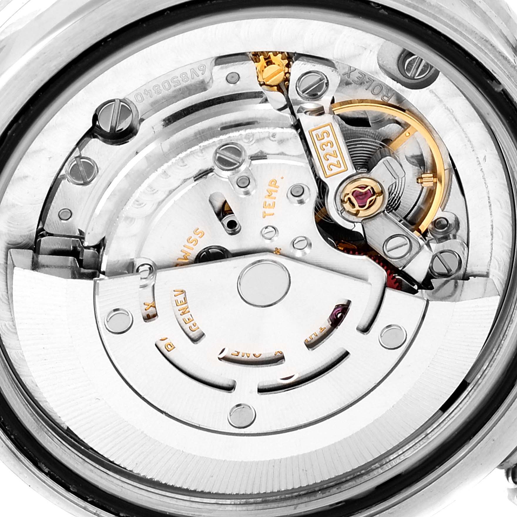 This image shows a close-up of the movement and internal mechanics of a Rolex Mid-Size 178384 Women
s Stainless Steel Pink Dial 178384 Women
s Stainless Steel Pink Dial model watch.