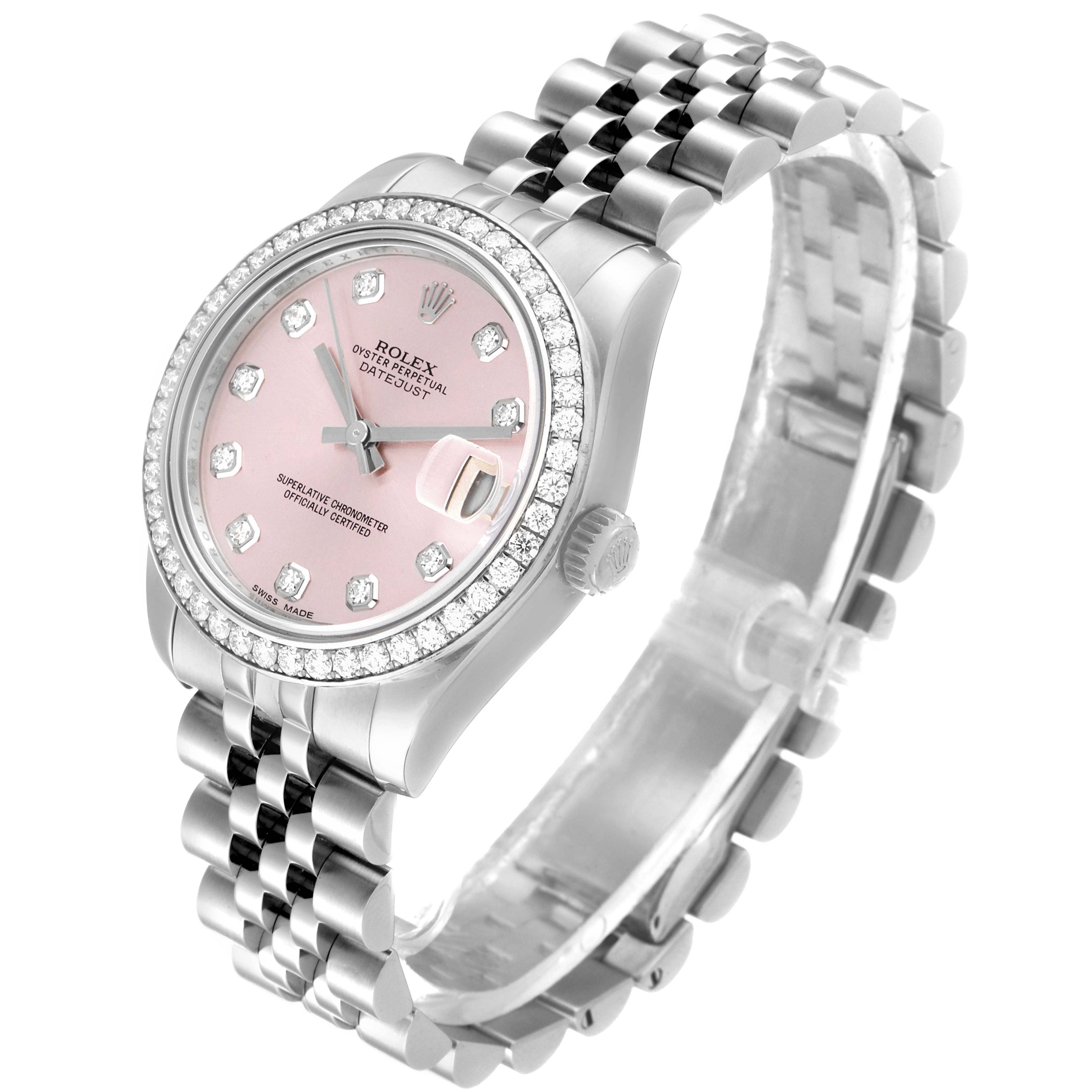 This Rolex Mid-Size 178384 Women
s Stainless Steel Pink Dial 178384 Women
s Stainless Steel Pink Dial Datejust watch is shown at a three-quarter angle, displaying its pink dial, diamond bezel, and jubilee bracelet.