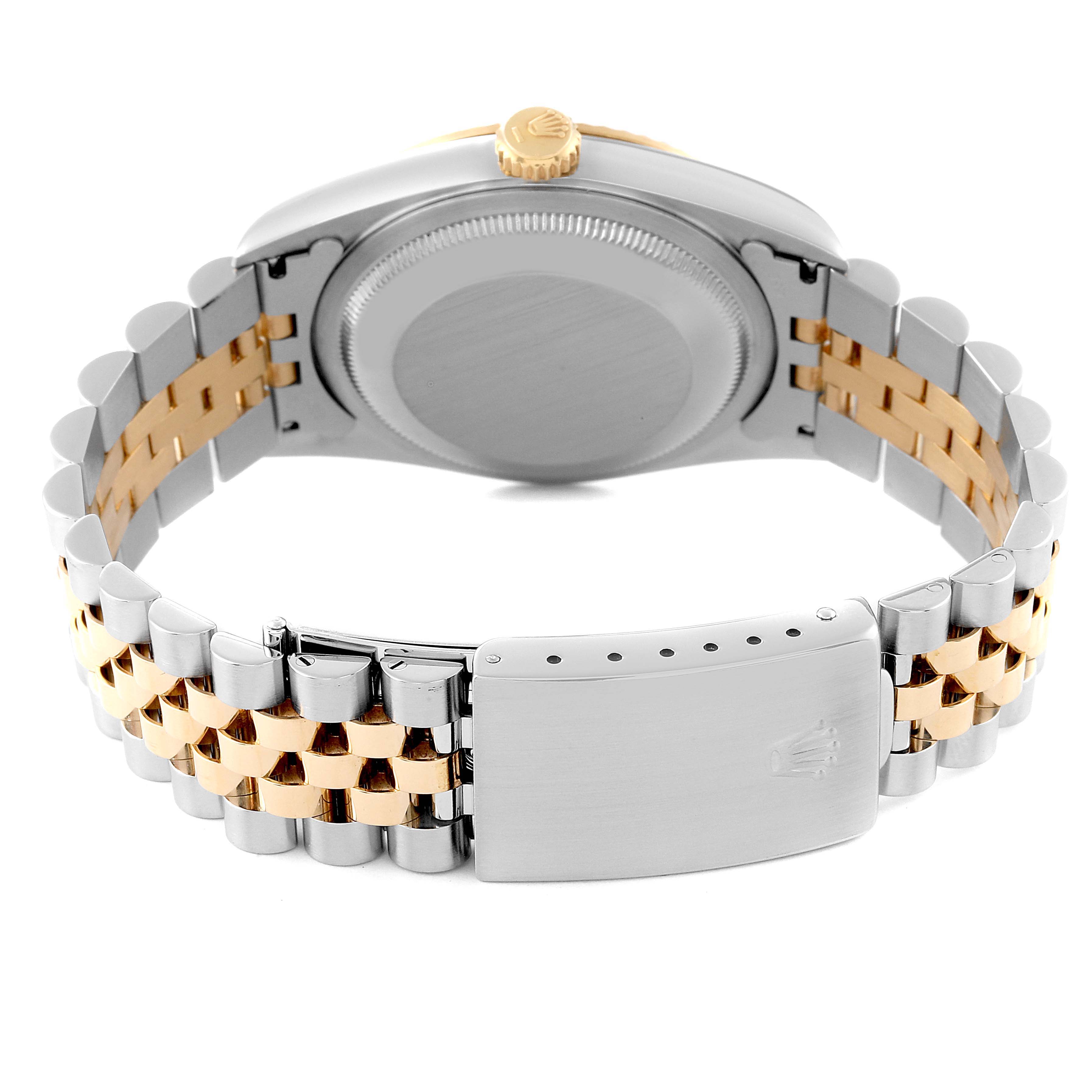 The image shows the back view of a Rolex Datejust 16233 Men's Steel and Gold (two tone) Grey Dial 16233 Men's Steel and Gold (two tone) Grey Dial watch, featuring its case, crown, and two-tone Jubilee bracelet.
