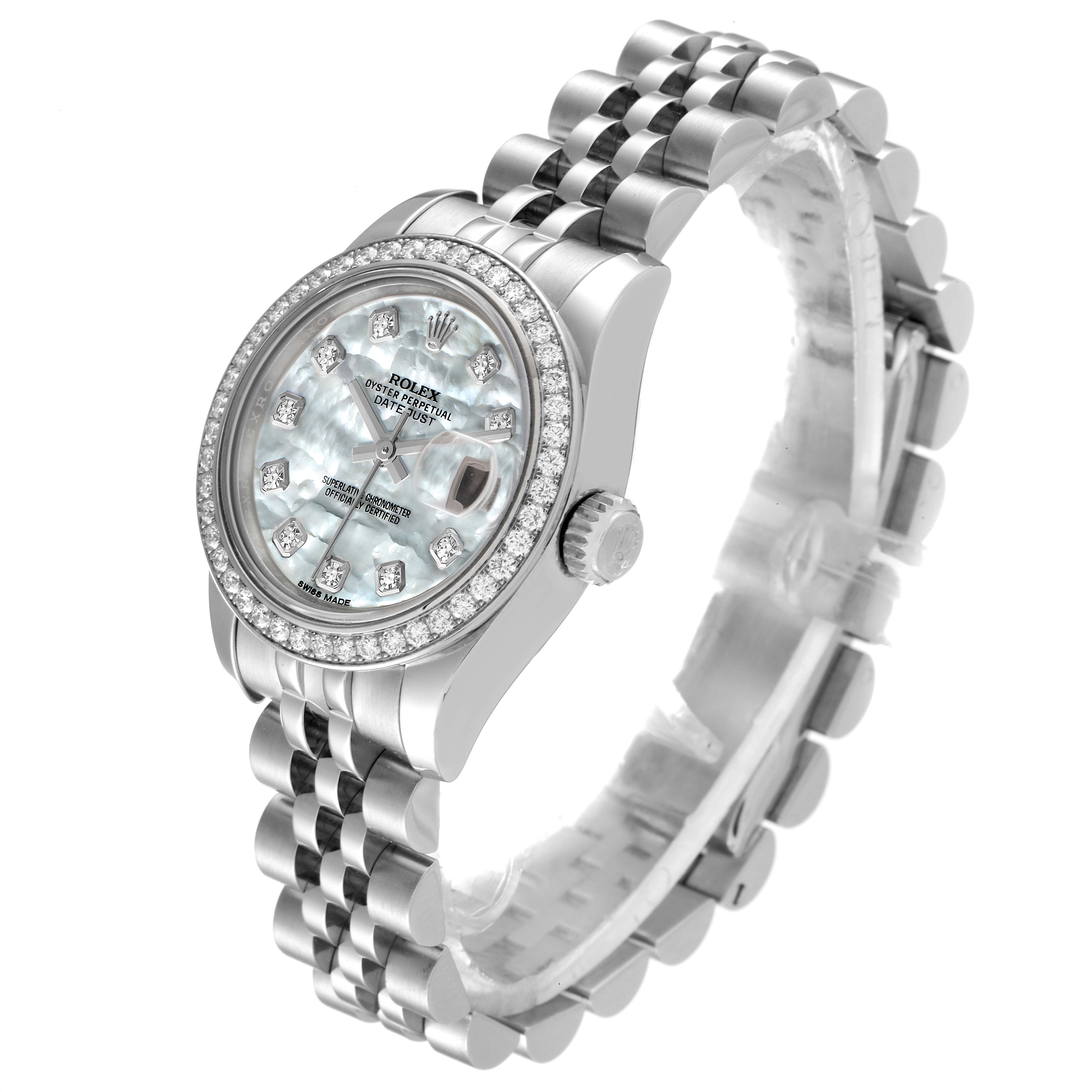 This Rolex Datejust 179384 Women
s Stainless Steel Mother of Pearl Dial 179384 Women
s Stainless Steel Mother of Pearl Dial watch is shown at an oblique angle, highlighting its face, bezel, crown, and bracelet.