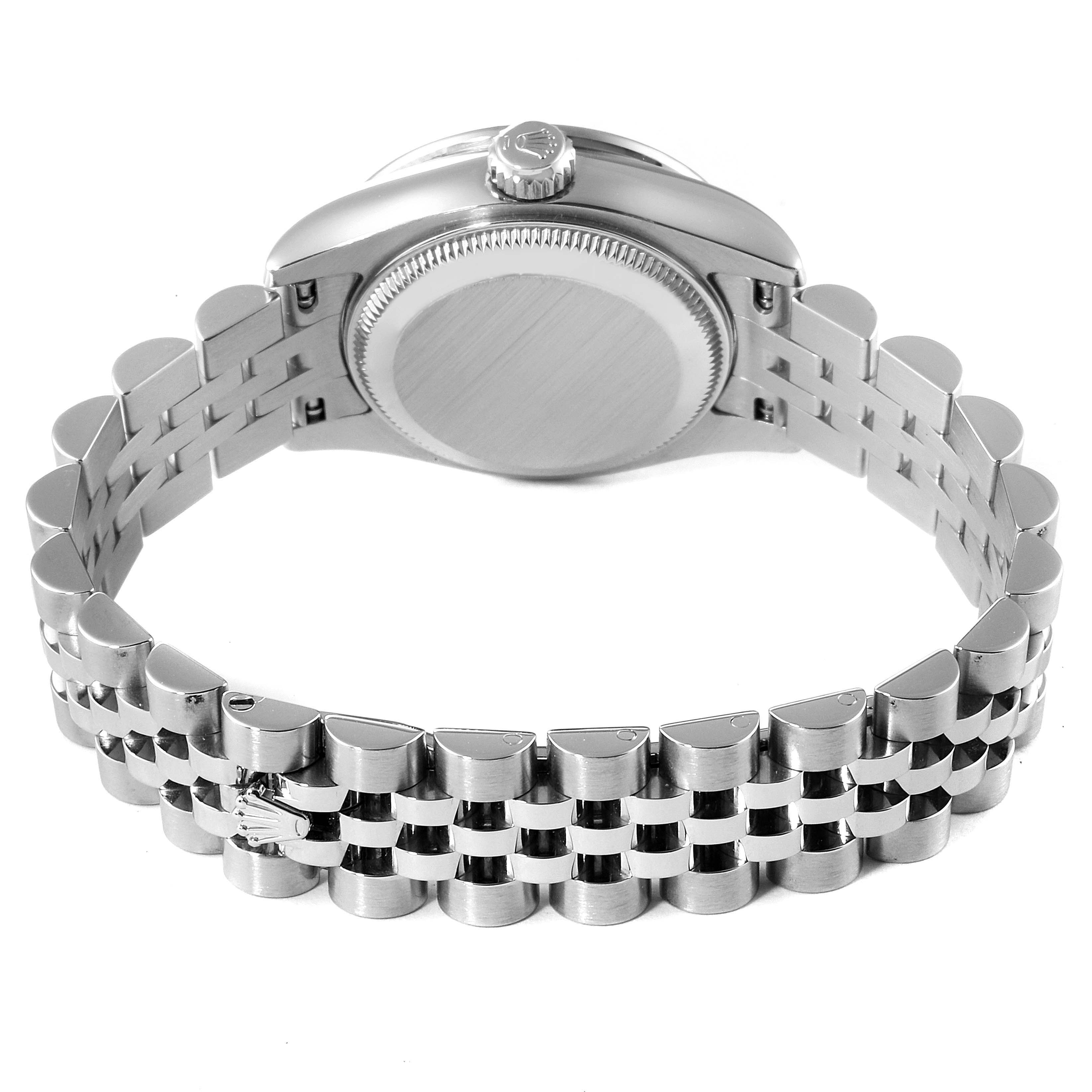 The image shows the back case and bracelet of a Rolex Datejust 179384 Women
s Stainless Steel Mother of Pearl Dial 179384 Women
s Stainless Steel Mother of Pearl Dial watch from a rear angle.