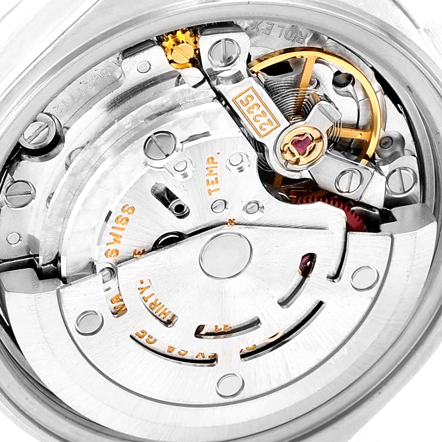 This image shows a close-up view of the movement and internal mechanics of a Rolex Datejust 79173 Women's Steel and Gold (two tone) Black Dial 79173 Women's Steel and Gold (two tone) Black Dial watch.