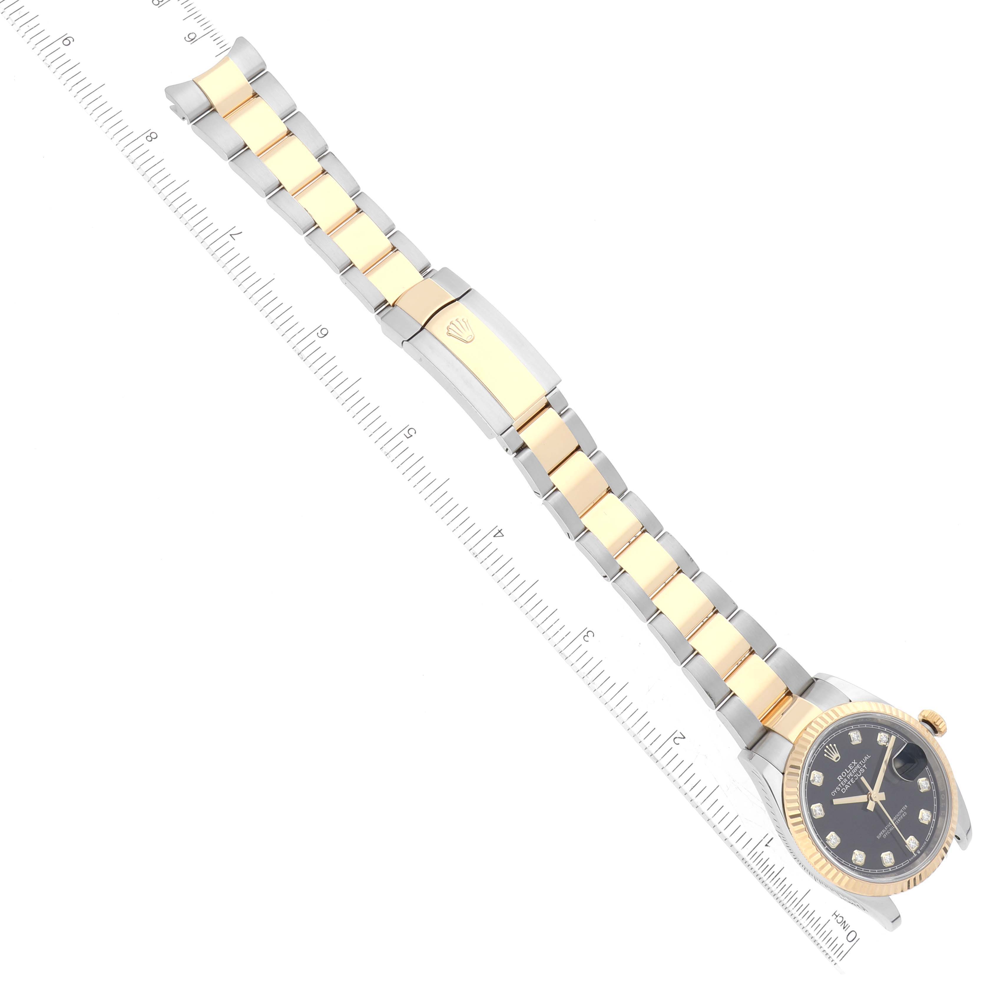 The image shows a top-down view of a Rolex Datejust 126233 Men's Steel and Gold (two tone) Black Dial 126233 Men's Steel and Gold (two tone) Black Dial watch displaying the bracelet, clasp, and part of the dial.
