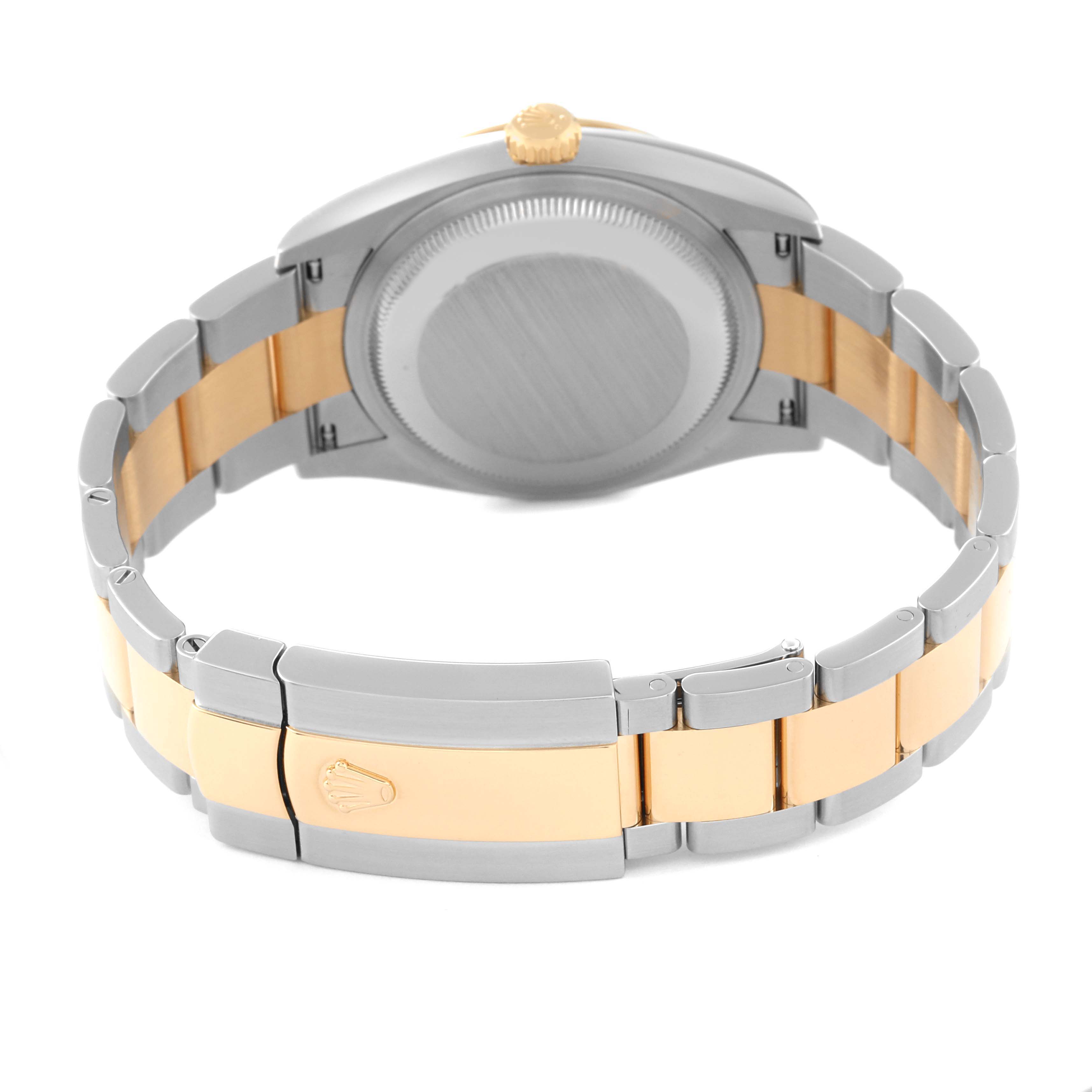 The image shows the back of a Rolex Datejust 126233 Men's Steel and Gold (two tone) Black Dial 126233 Men's Steel and Gold (two tone) Black Dial watch, highlighting its case back, crown, and two-tone bracelet with the clasp.