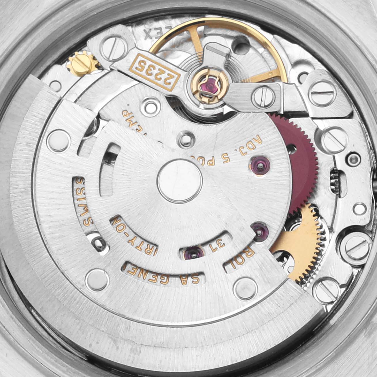 The image shows the movement mechanism of a Rolex Datejust 79173 Women's Steel and Gold (two tone) Blue Dial 79173 Women's Steel and Gold (two tone) Blue Dial watch from a top-down angle, highlighting gears and the rotor.