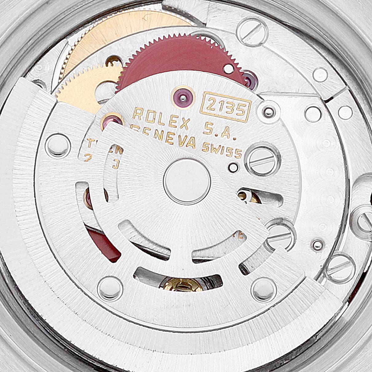 The image shows an internal view of the Rolex Datejust 69173 Women's Steel and Gold (two tone) Champagne Dial 69173 Women's Steel and Gold (two tone) Champagne Dial movement mechanism, featuring gears and the oscillating weight.