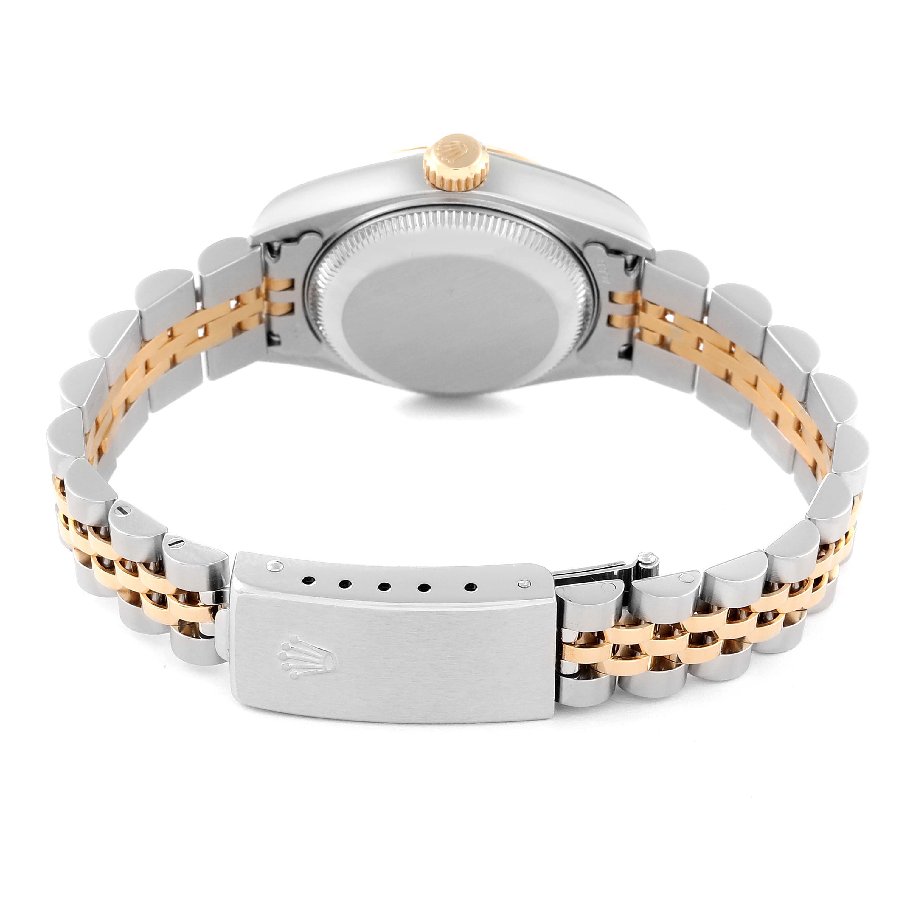 The image shows the back and bracelet of a Rolex Datejust 79173 Women's Steel and Gold (two tone) Champagne Dial 79173 Women's Steel and Gold (two tone) Champagne Dial watch, highlighting its clasp and two-tone links.