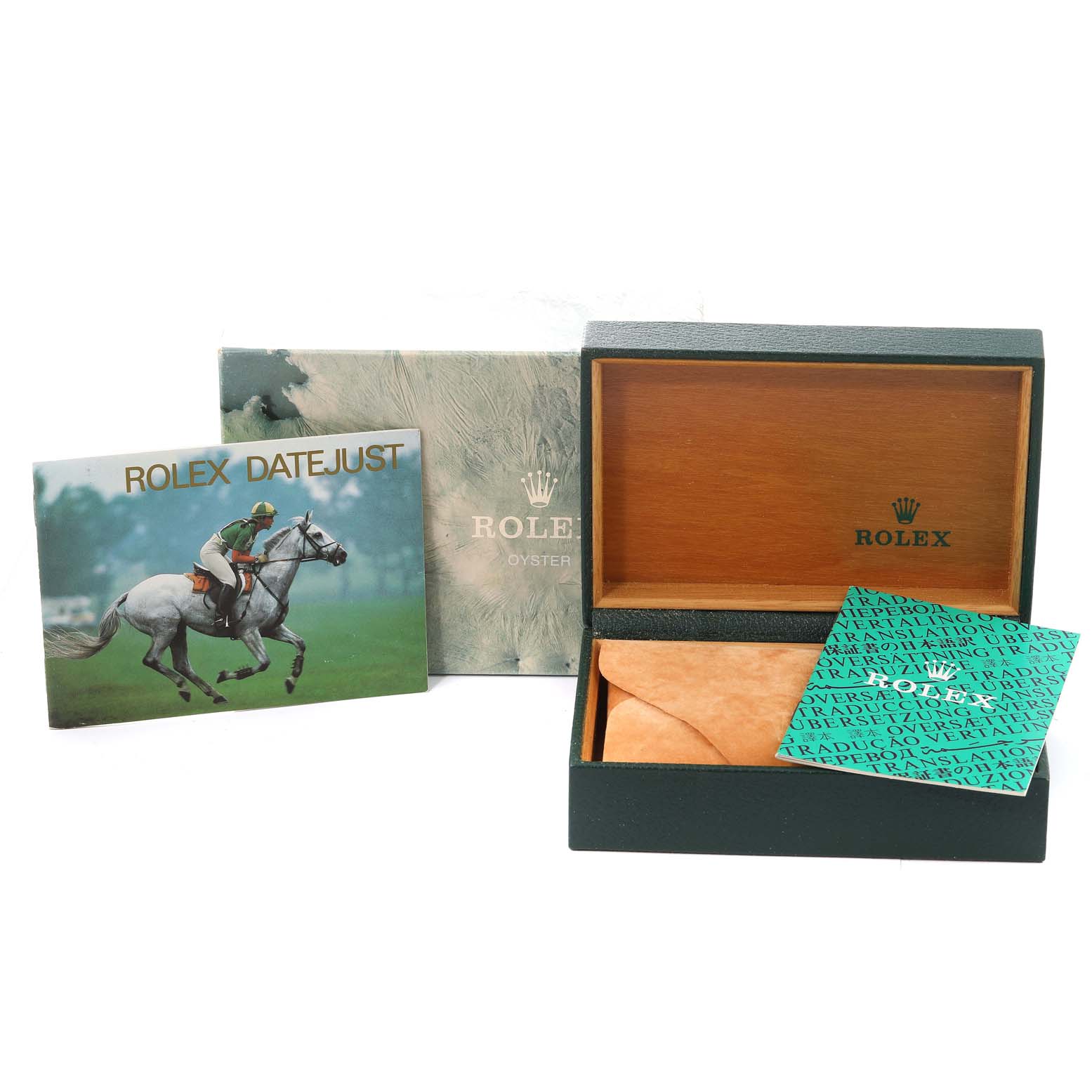 This image shows the box, manuals, and packaging for a Rolex Datejust 16013 Men's Steel and Gold (two tone) Champagne Dial 16013 Men's Steel and Gold (two tone) Champagne Dial model.