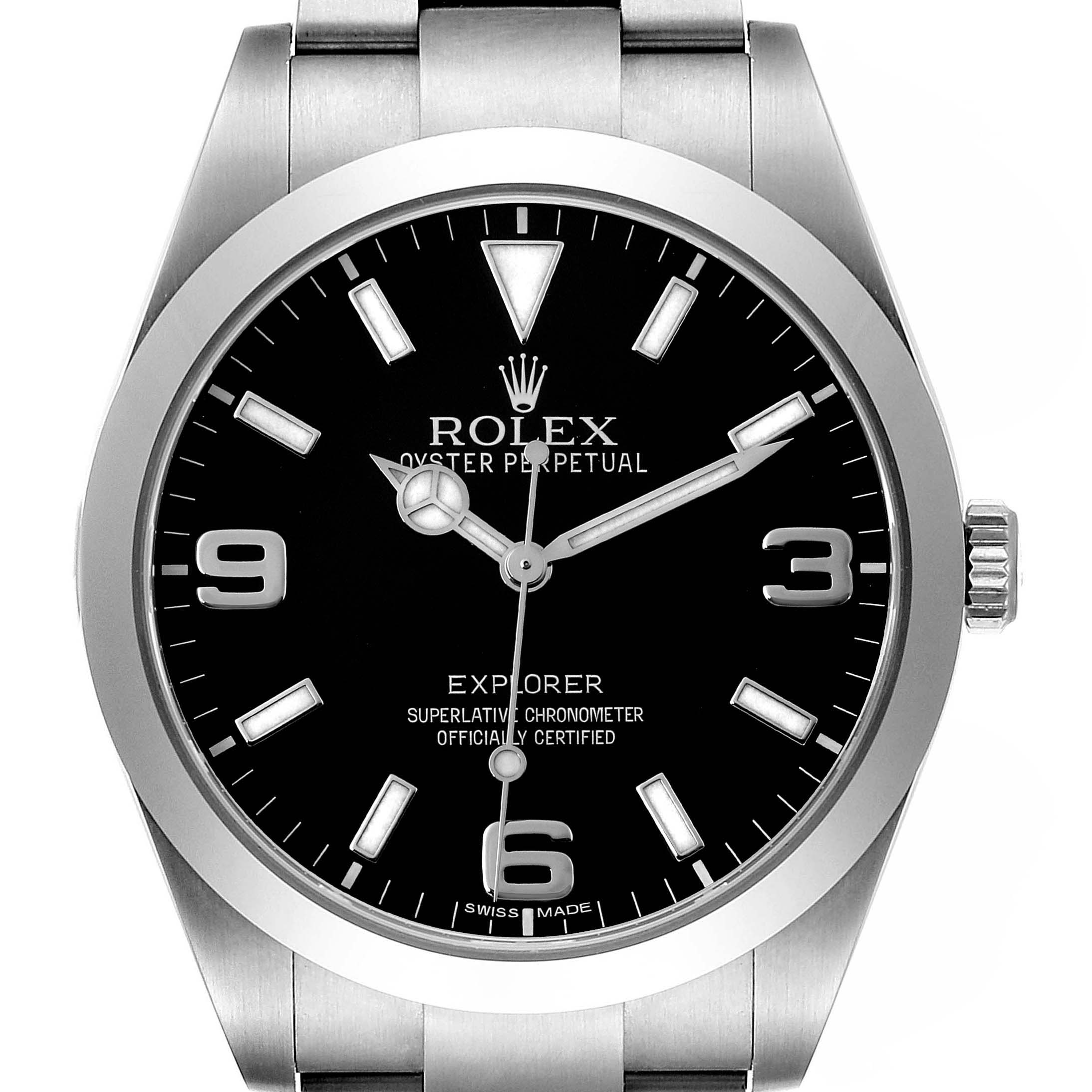 The Rolex Explorer 214270 Men's Stainless Steel Black Dial 214270 Men's Stainless Steel Black Dial watch is shown from the front, highlighting the dial, markers, hands, and partial bracelet.