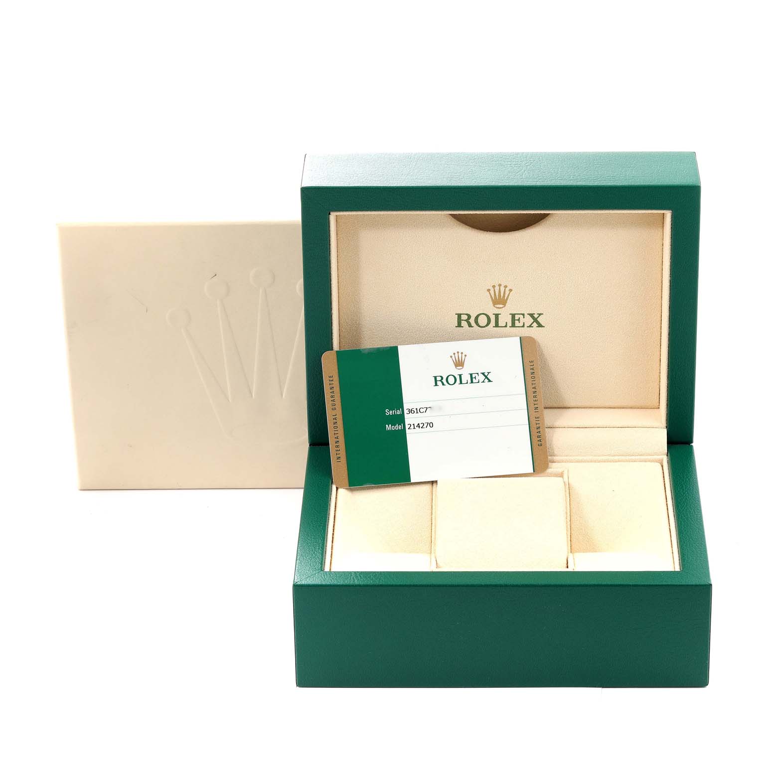 The image shows a green Rolex box for the Explorer model along with its card and cushion inserts, viewed from the front.