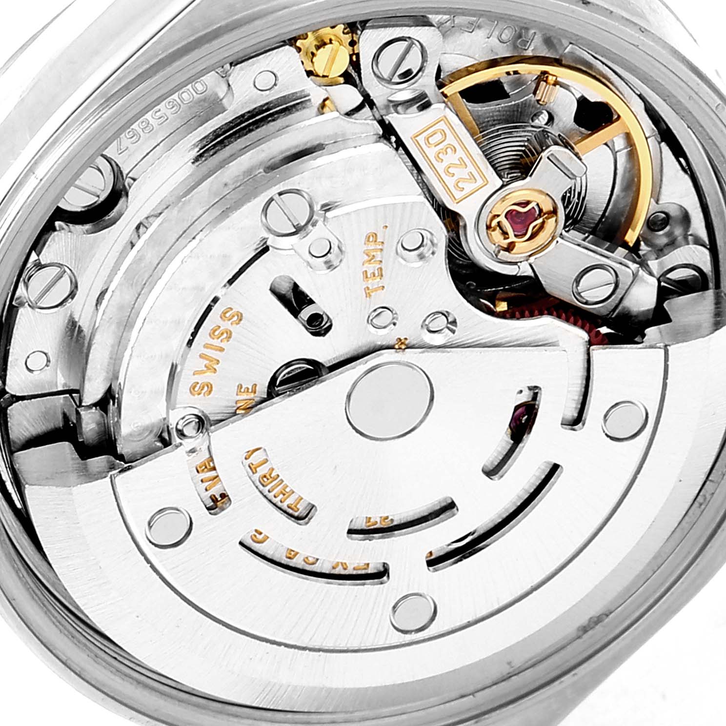 This image shows the internal mechanical movement of a Rolex Datejust 76080 Women's Stainless Steel Black Dial 76080 Women's Stainless Steel Black Dial watch from a close-up angle.