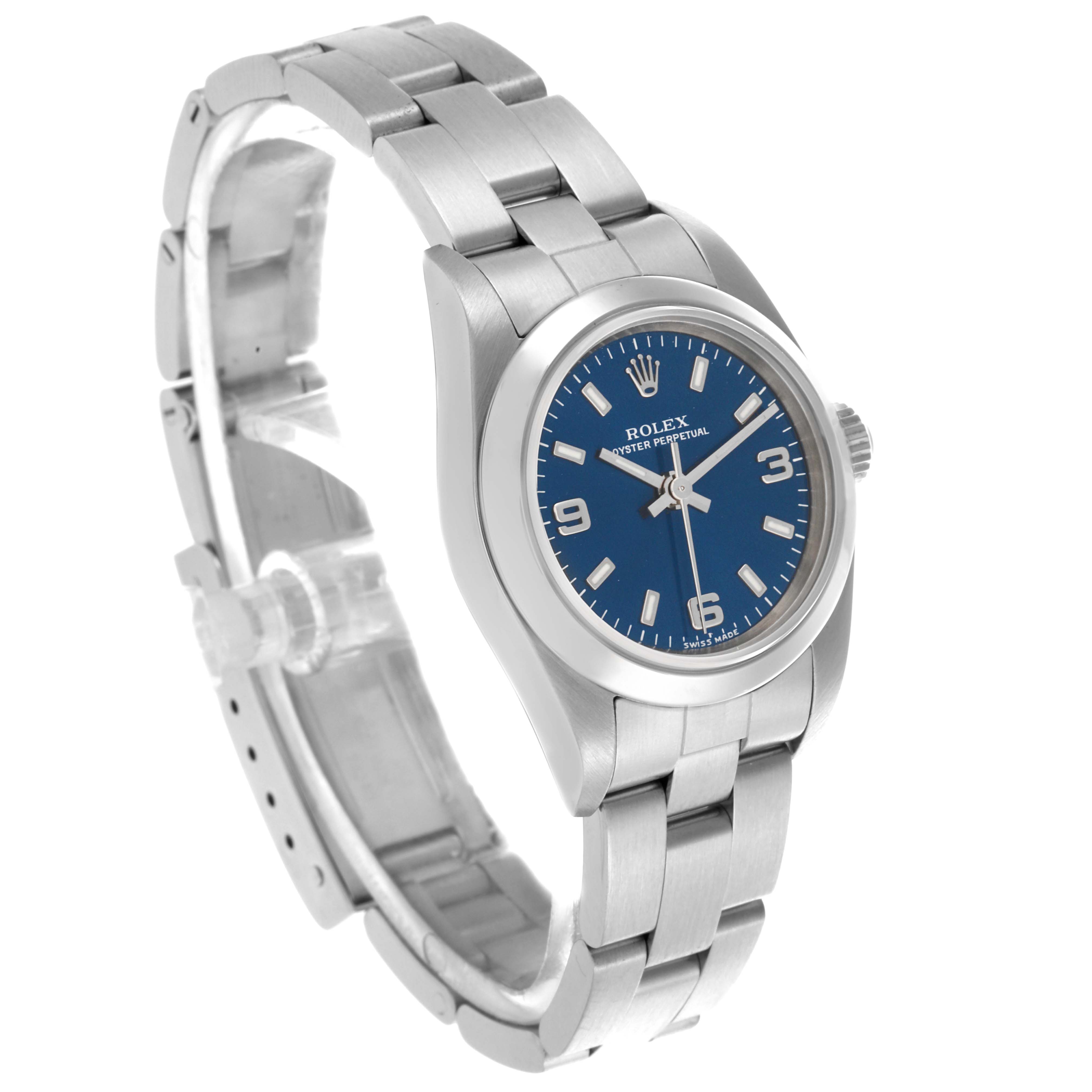 The Rolex Oyster Perpetual 76080 Women's Stainless Steel Blue Dial 76080 Women's Stainless Steel Blue Dial watch is shown at an angled side view, displaying the bracelet and blue dial.
