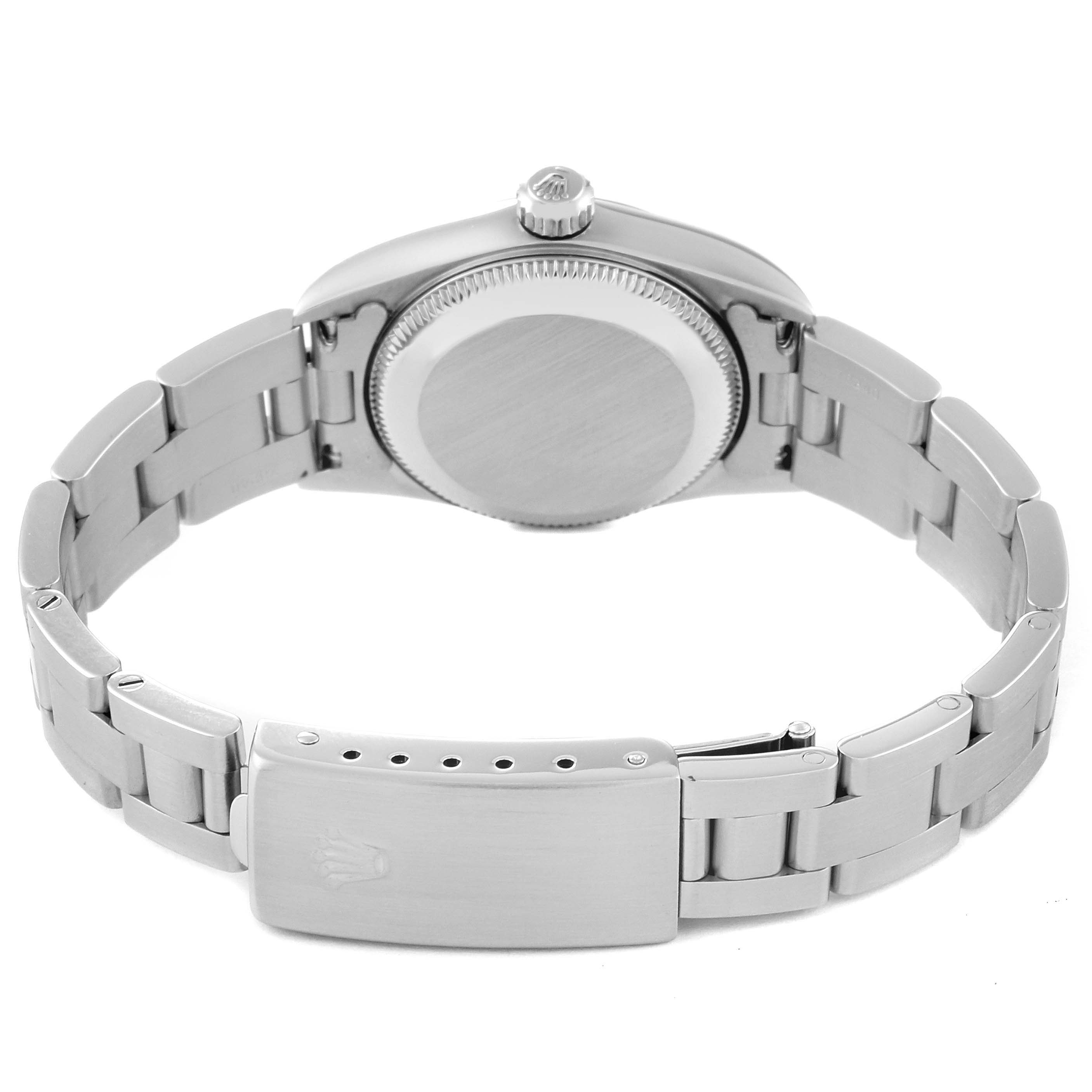 This image shows the back view of a Rolex Oyster Perpetual 76080 Women's Stainless Steel Black Dial 76080 Women's Stainless Steel Black Dial watch, highlighting the case back, crown, and bracelet with a clasp.