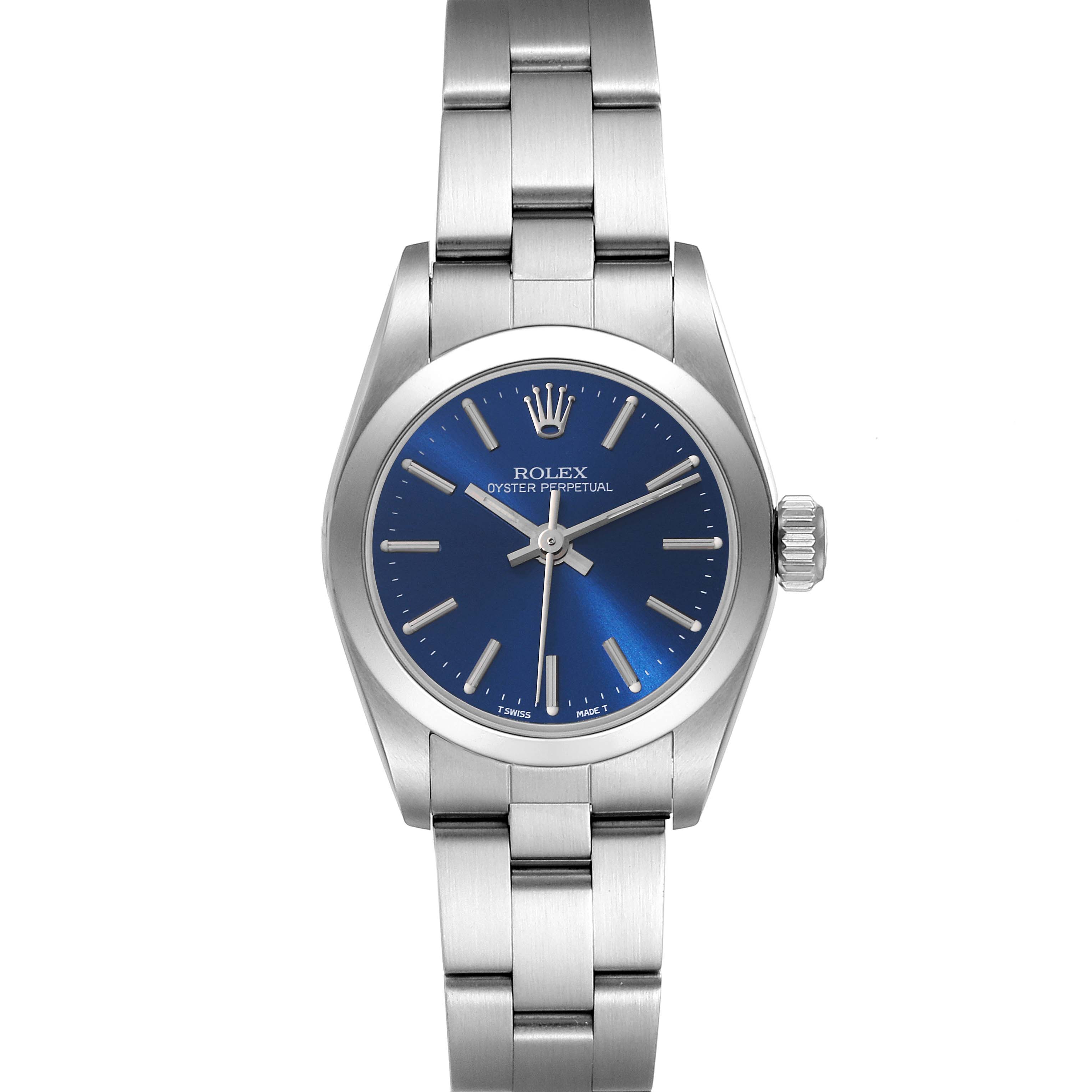 The image shows a front view of a Rolex Oyster Perpetual 67180 Women
s Stainless Steel Blue Dial 67180 Women
s Stainless Steel Blue Dial watch with a blue dial and stainless steel bracelet.