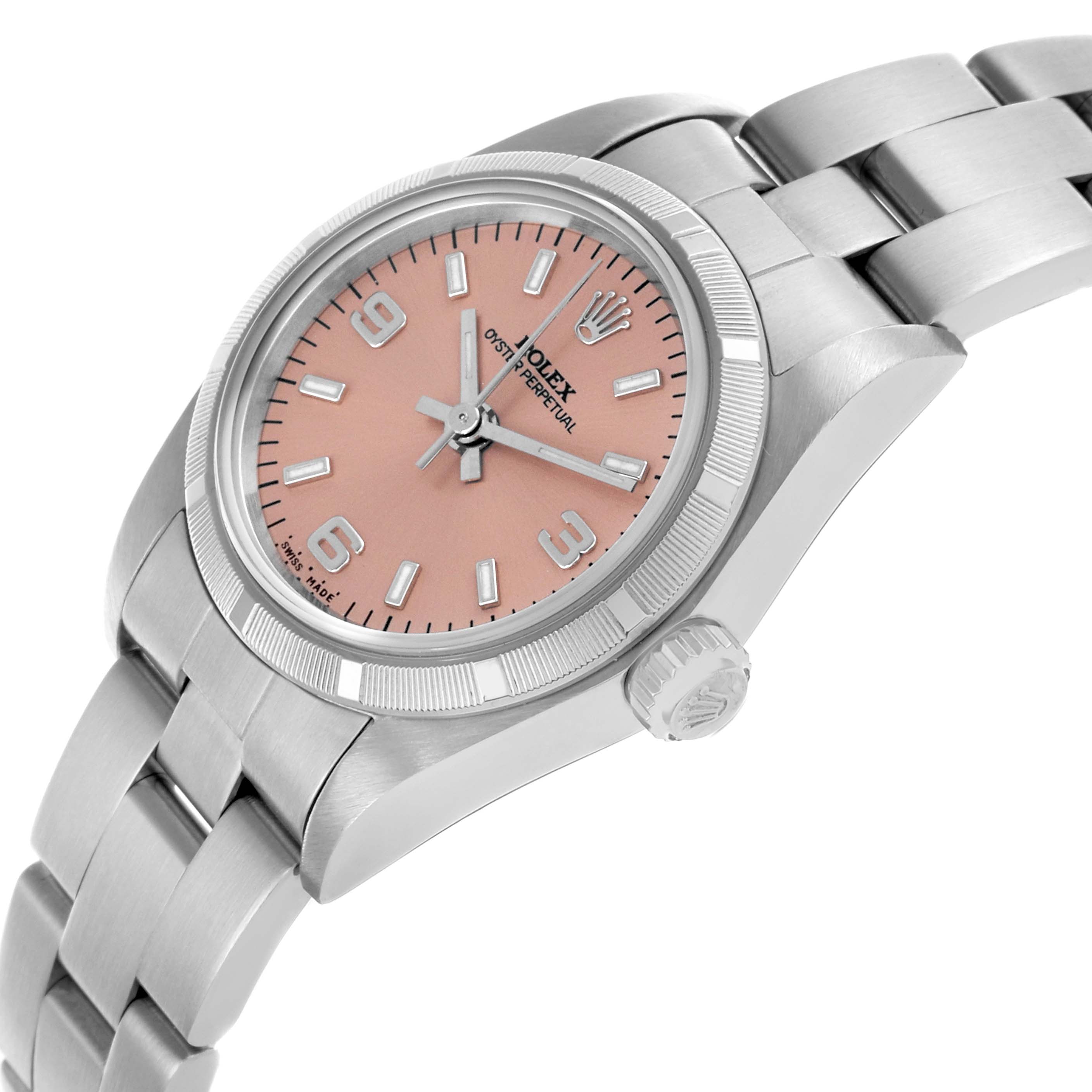 The Rolex Oyster Perpetual 76030 Women's Stainless Steel Pink Dial 76030 Women's Stainless Steel Pink Dial watch is shown at a slight angle displaying the face, crown, and part of the metal bracelet.