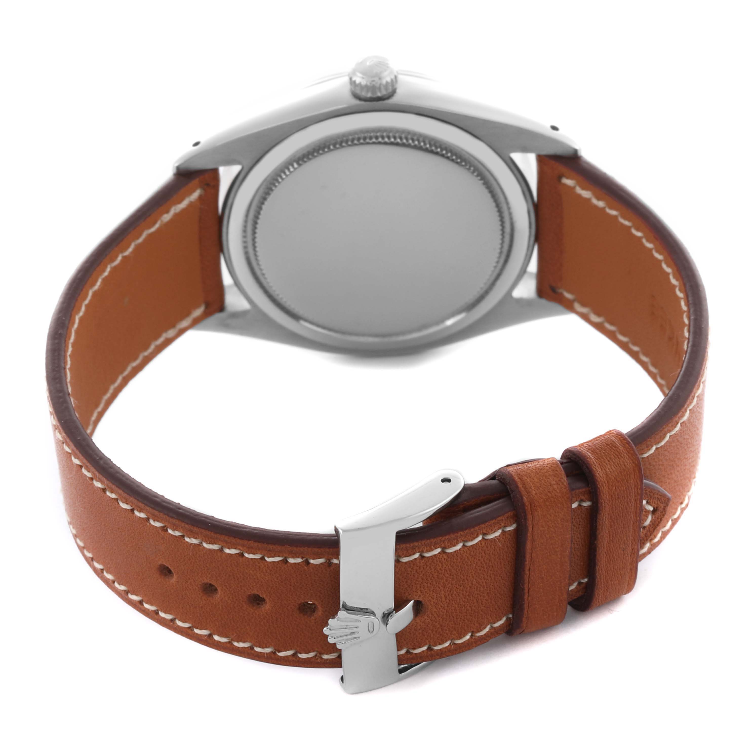 The image shows the back of the Rolex Date 6694 Men's Stainless Steel Black Dial 6694 Men's Stainless Steel Black Dial watch with a leather strap and buckle.