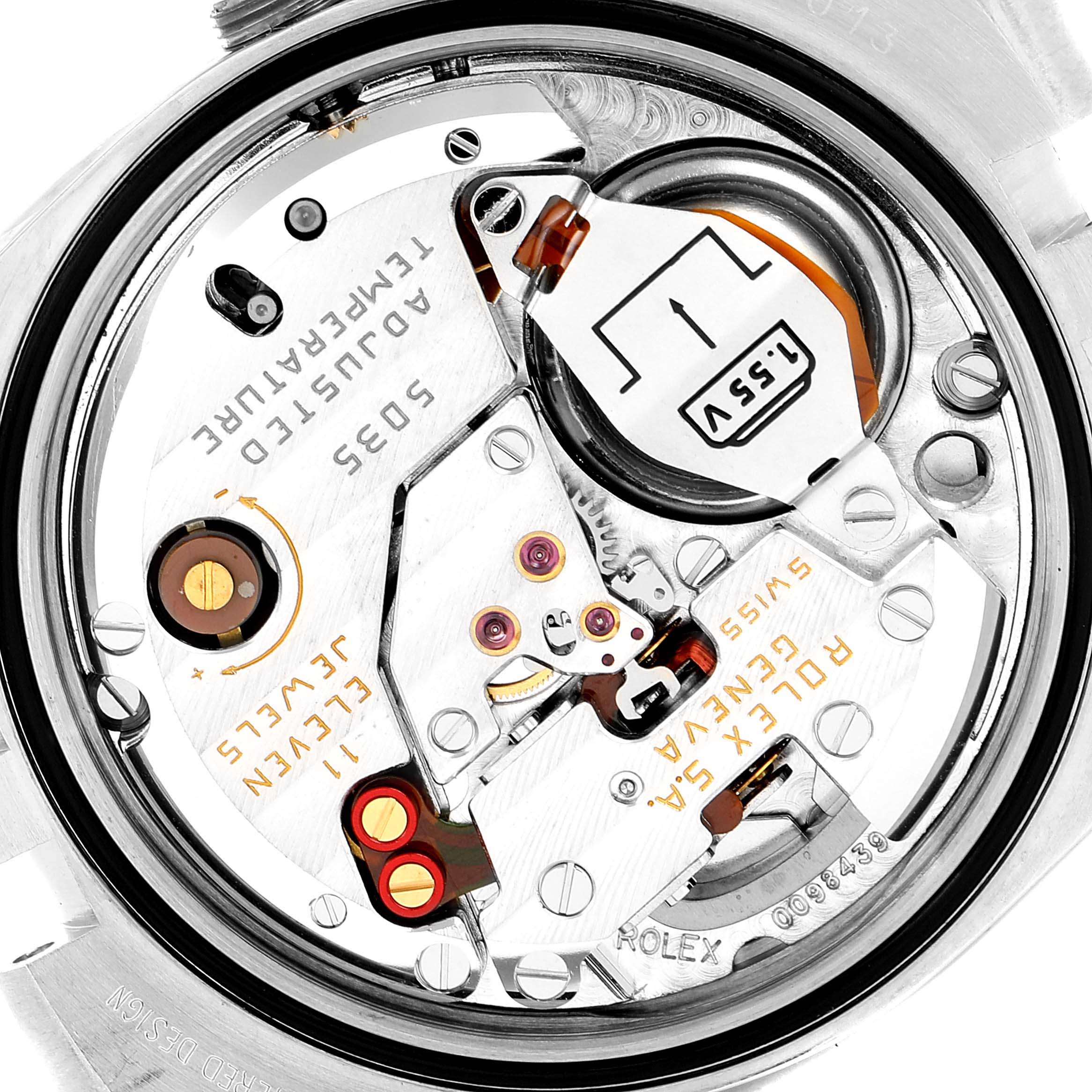 This image shows the inner mechanism of the Rolex Oysterquartz 17013 Men's Steel and Gold (two tone) White Dial 17013 Men's Steel and Gold (two tone) White Dial watch, exposing various components including the battery and electronic circuits.