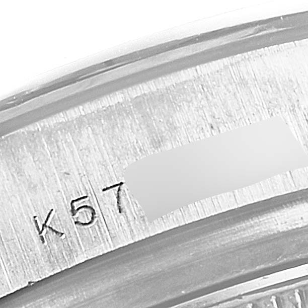 This is a close-up angle showing the serial number and part of the casing of a Rolex Pearlmaster 80299 Women's White Gold Mother of Pearl Dial 80299 Women's White Gold Mother of Pearl Dial watch.
