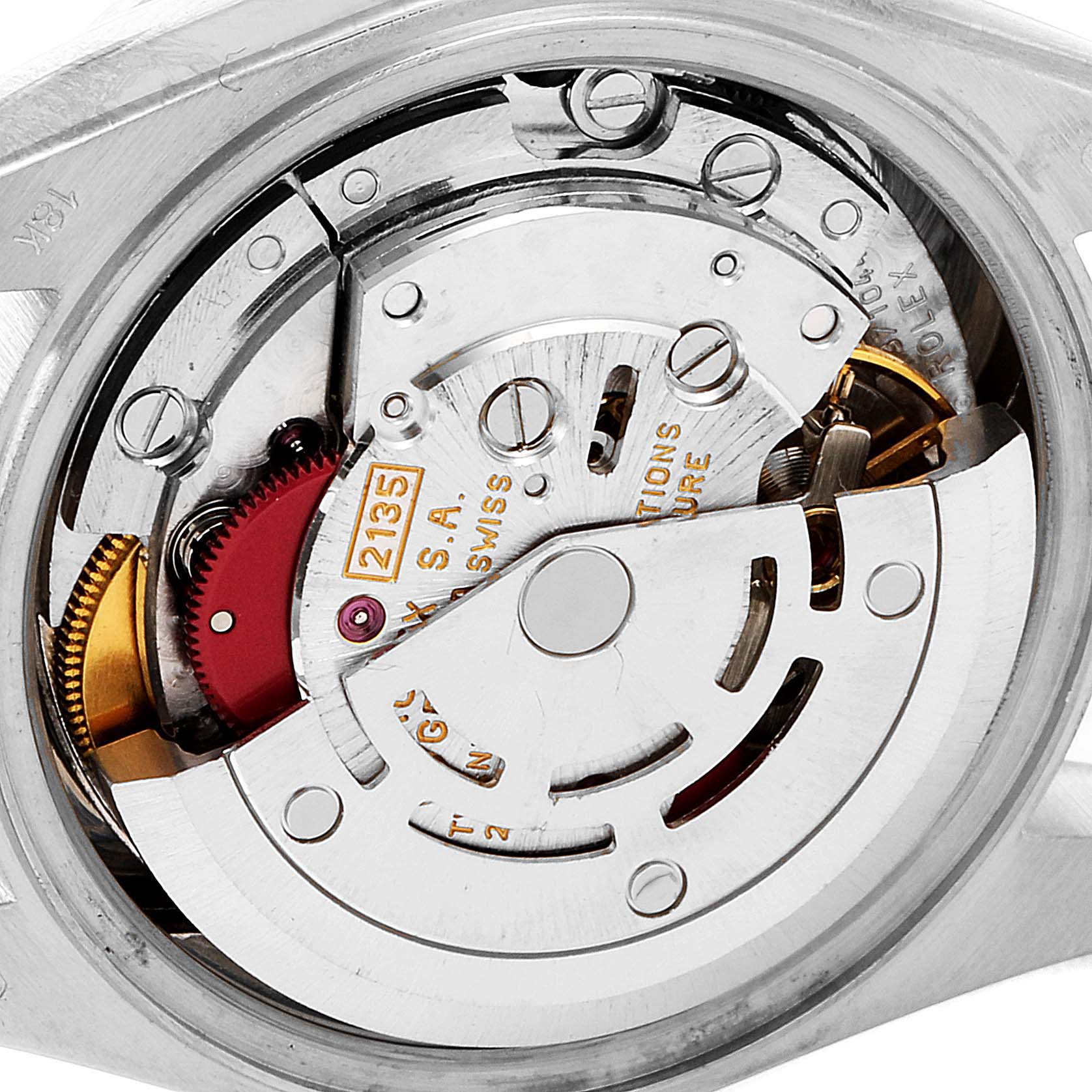 The image shows a close-up view of the movement mechanism inside a Rolex President 69139 Women
s White Gold Mother of Pearl Dial 69139 Women
s White Gold Mother of Pearl Dial model watch.