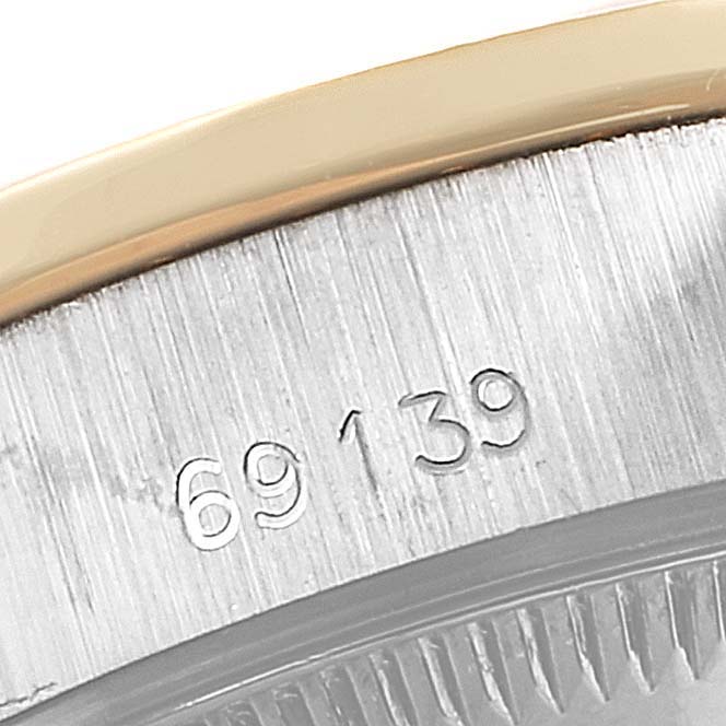 This close-up image shows the model number engraving on the case side of a Rolex President 69139 Women
s White Gold Mother of Pearl Dial 69139 Women
s White Gold Mother of Pearl Dial watch.
