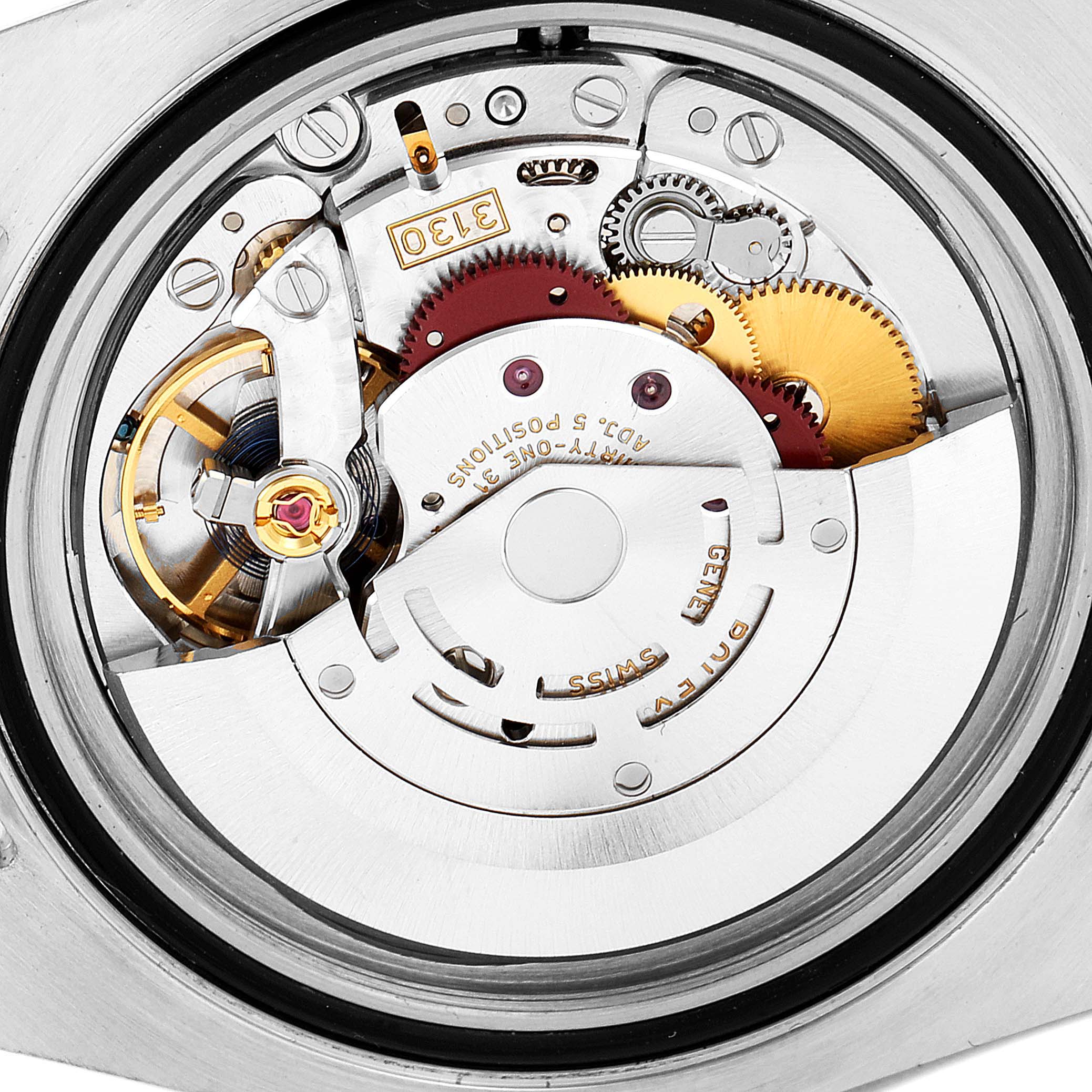 This image shows the intricate inner movement mechanism of a Rolex Submariner 114060 Men
s Stainless Steel Black Dial 114060 Men
s Stainless Steel Black Dial watch from a close-up rear angle.