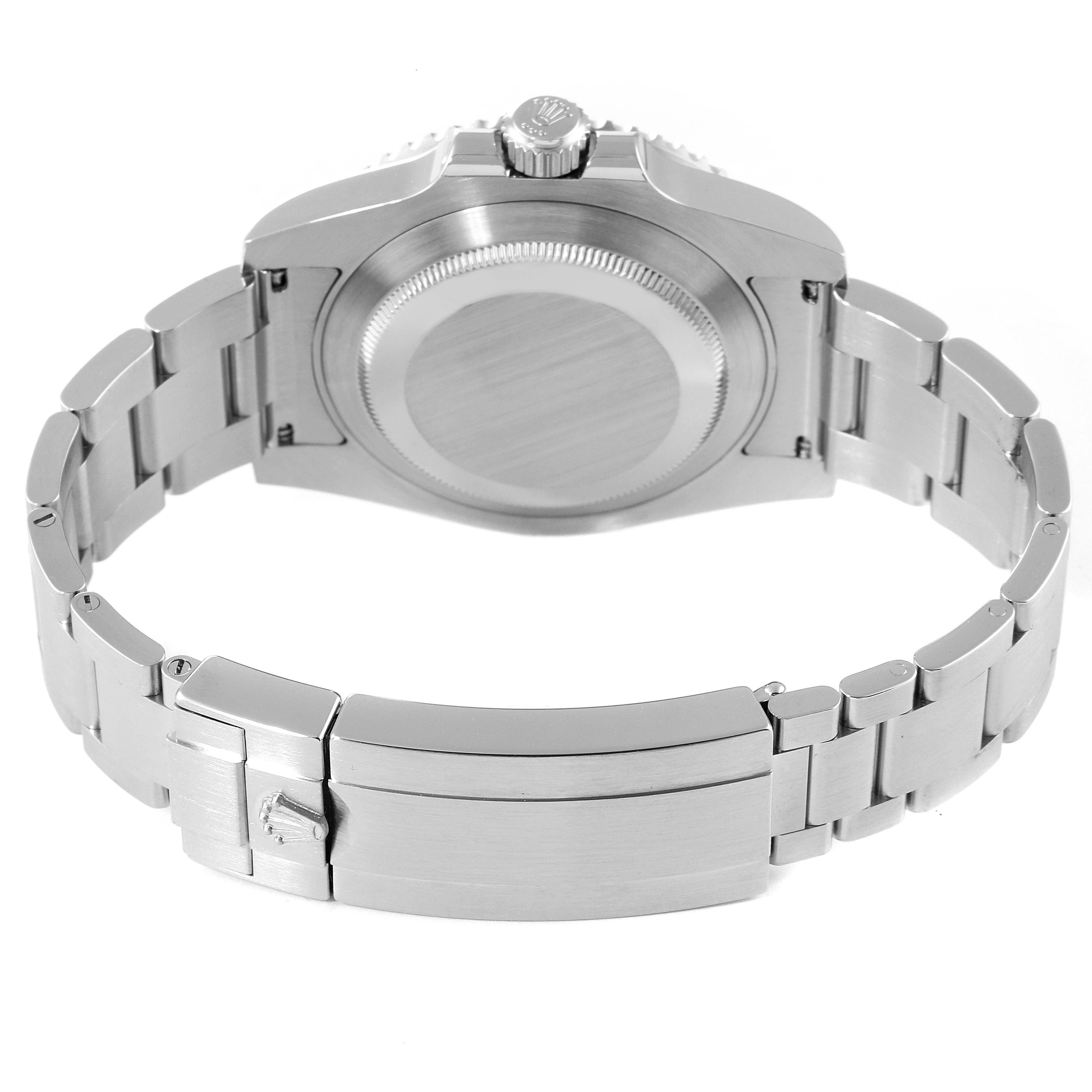 The image shows the back view of the Rolex Submariner 114060 Men
s Stainless Steel Black Dial 114060 Men
s Stainless Steel Black Dial watch, highlighting its case back, crown, and metal bracelet with clasp.