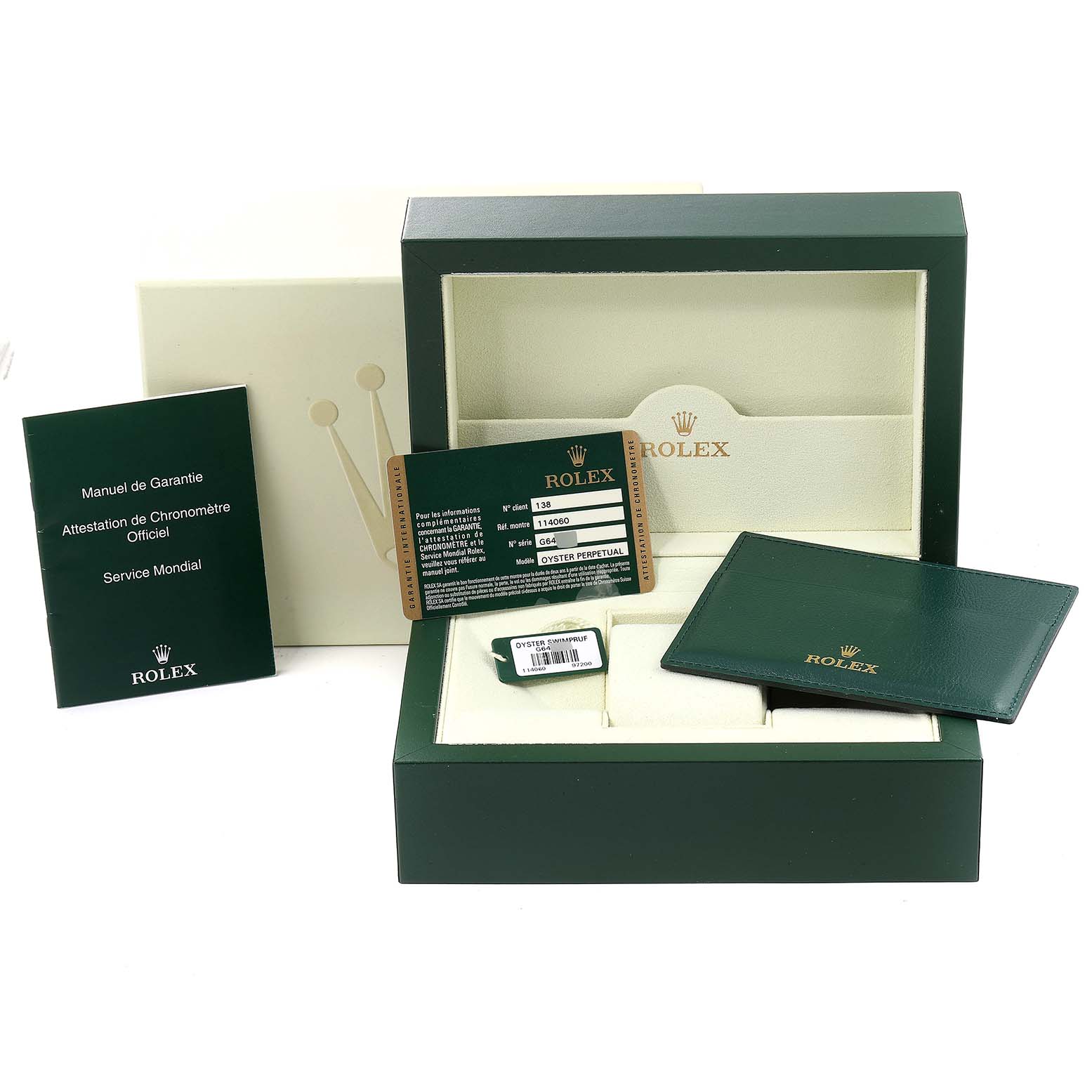 The image shows the packaging, warranty card, manuals, and accessories for the Rolex Submariner 114060 Men
s Stainless Steel Black Dial 114060 Men
s Stainless Steel Black Dial watch.