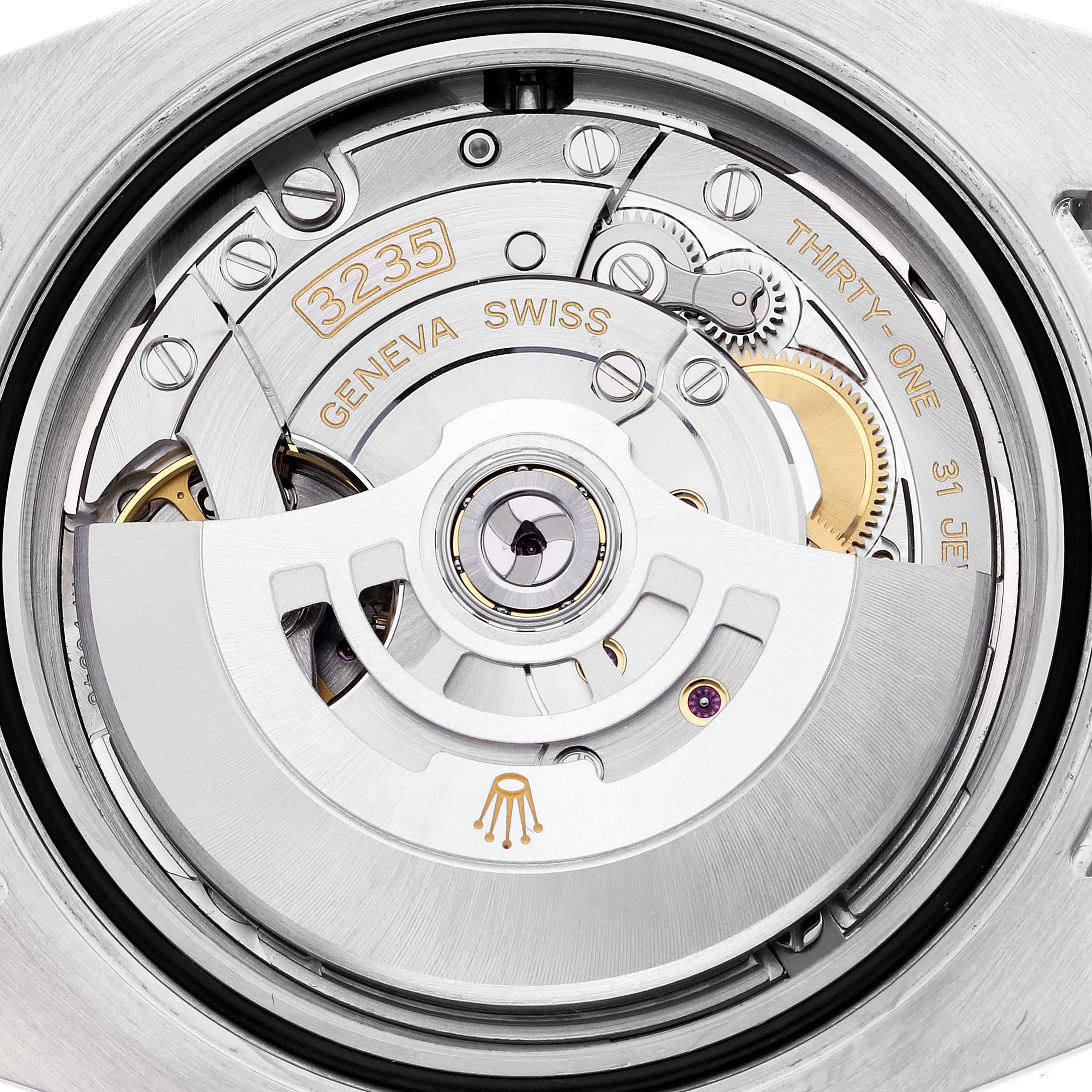 The image shows a close-up of the Rolex Submariner 126613LN Men's Steel and Gold (two tone) Black Dial 126613LN Men's Steel and Gold (two tone) Black Dial's movement, highlighting the rotor and internal mechanics.