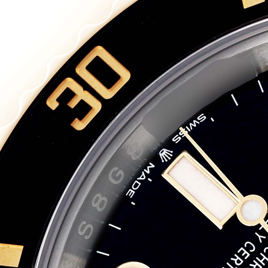 The image shows a close-up of the dial and bezel at an angle, highlighting the "30" marker on a Rolex Submariner 126613LN Men's Steel and Gold (two tone) Black Dial 126613LN Men's Steel and Gold (two tone) Black Dial.