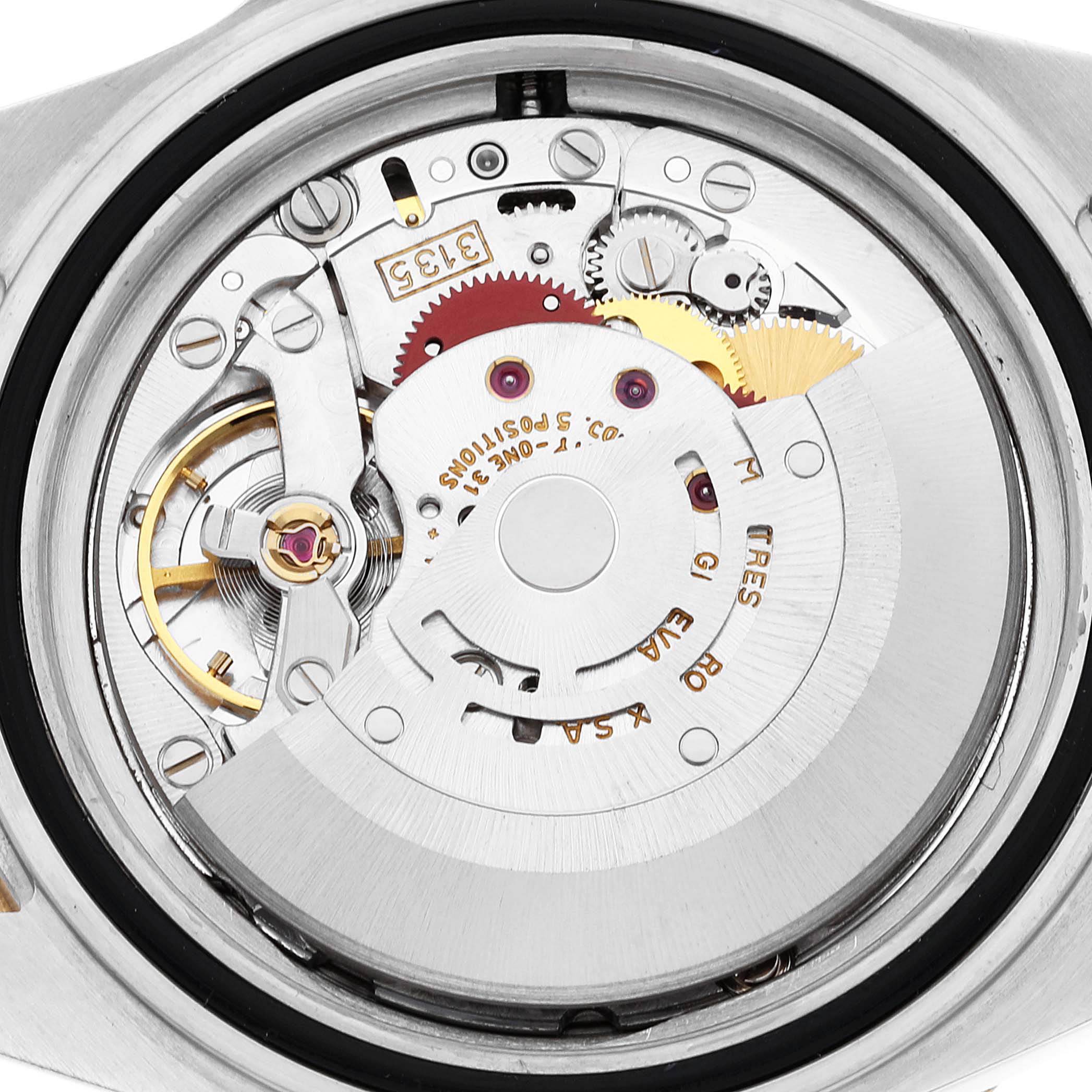 This image shows the internal movement mechanism of a Rolex Submariner 16613 Men's Steel and Gold (two tone) Blue Dial 16613 Men's Steel and Gold (two tone) Blue Dial watch from a back view.