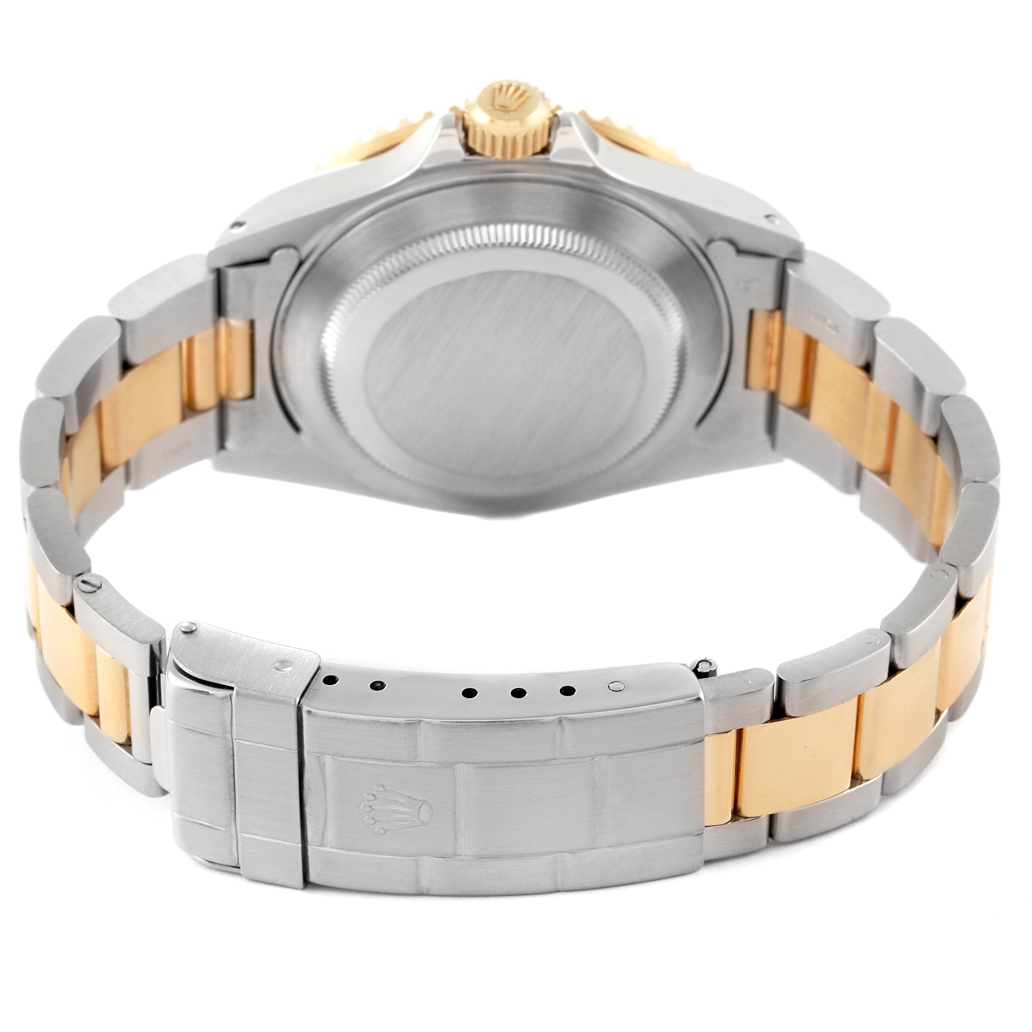 This image shows the back and clasp of a Rolex Submariner 16613 Men's Steel and Gold (two tone) Blue Dial 16613 Men's Steel and Gold (two tone) Blue Dial watch, highlighting the two-tone bracelet.