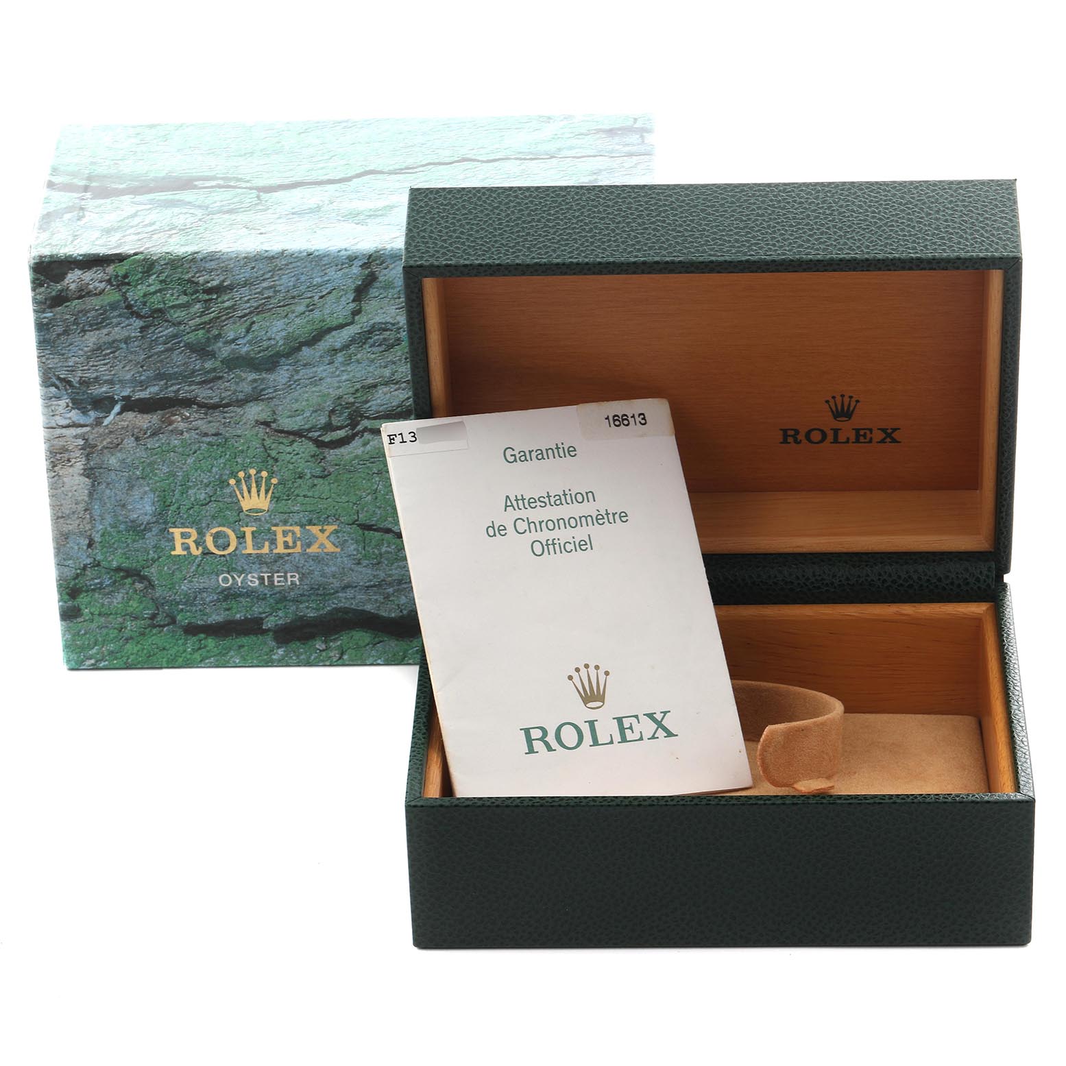 The image shows a Rolex Submariner 16613 Men's Steel and Gold (two tone) Silver Dial 16613 Men's Steel and Gold (two tone) Silver Dial watch box and warranty card from an angled perspective, with the lid open.