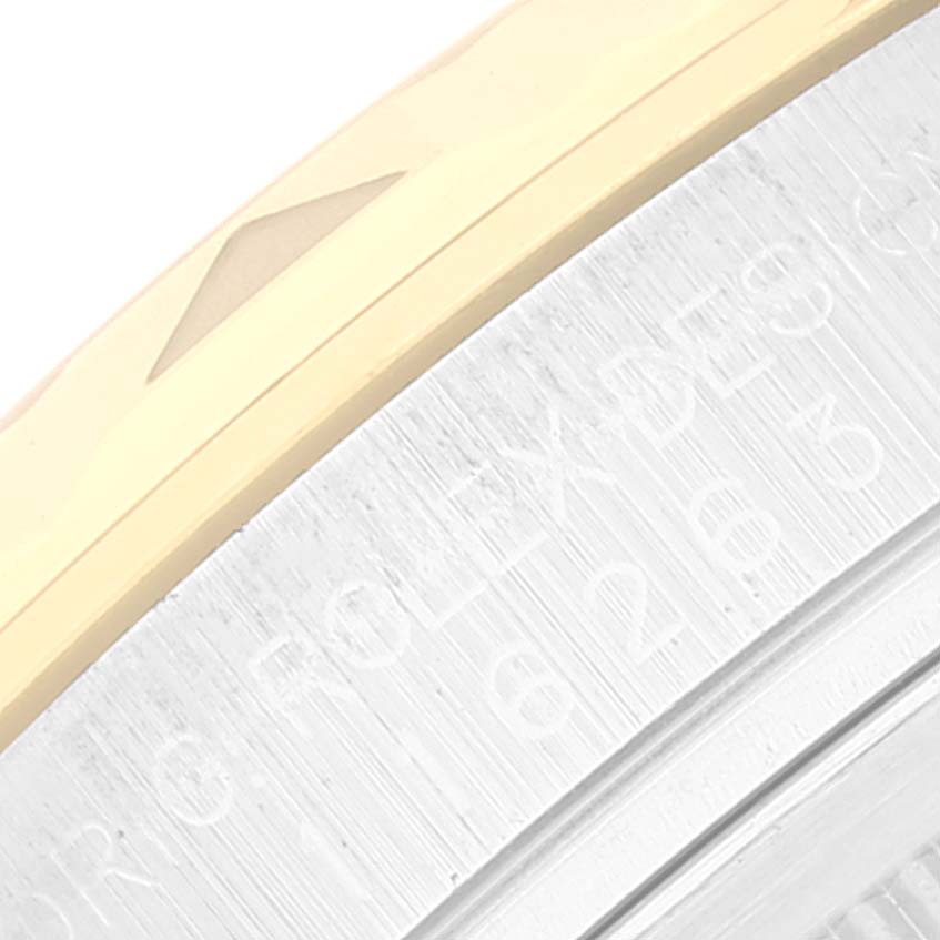 The image shows a close-up of the bezel and part of the case of the Rolex Turn-o-Graph 116263 Men's Steel and Gold (two tone) Grey Dial 116263 Men's Steel and Gold (two tone) Grey Dial watch.