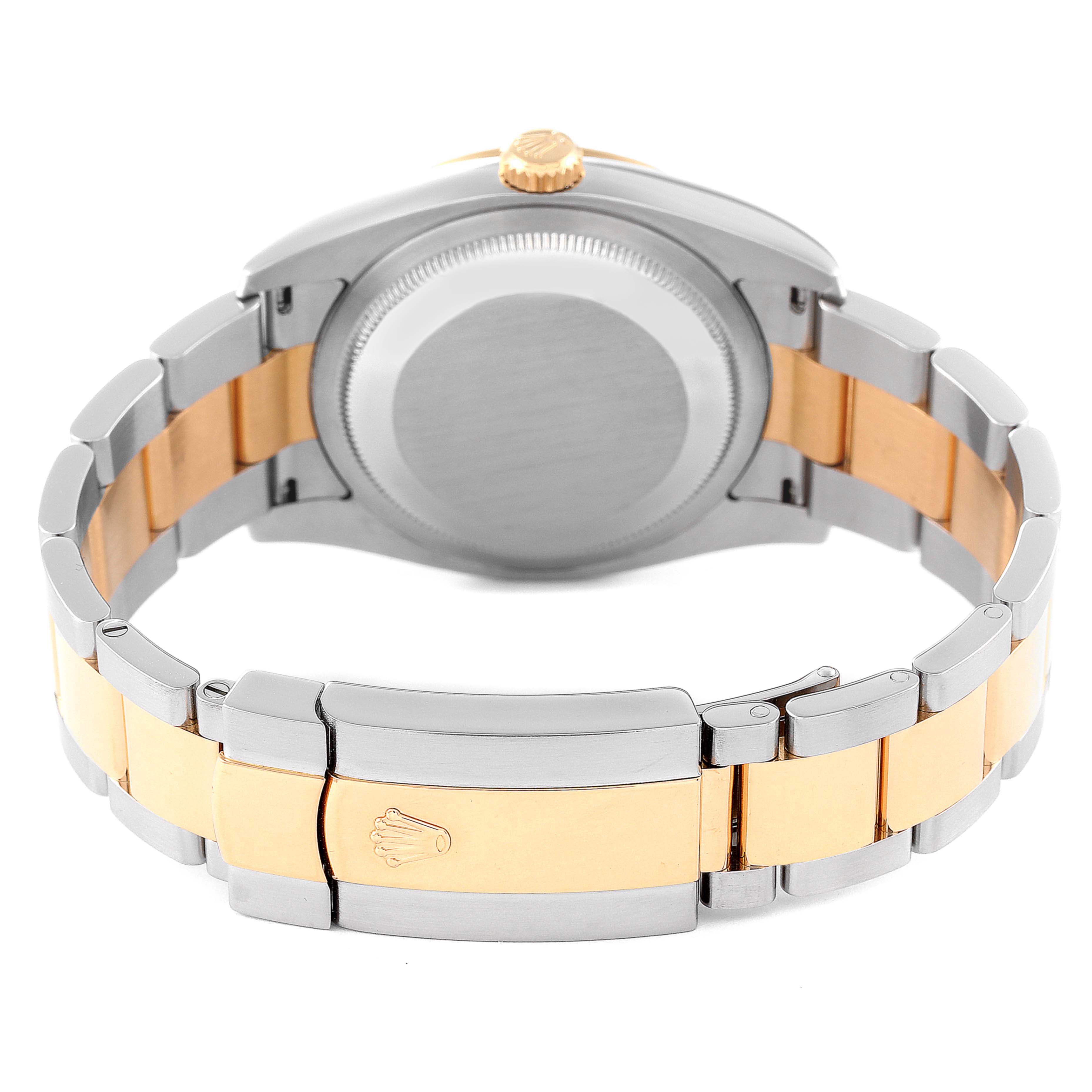 The image shows the back case and two-tone bracelet of a Rolex Turn-o-Graph 116263 Men's Steel and Gold (two tone) Grey Dial 116263 Men's Steel and Gold (two tone) Grey Dial watch.