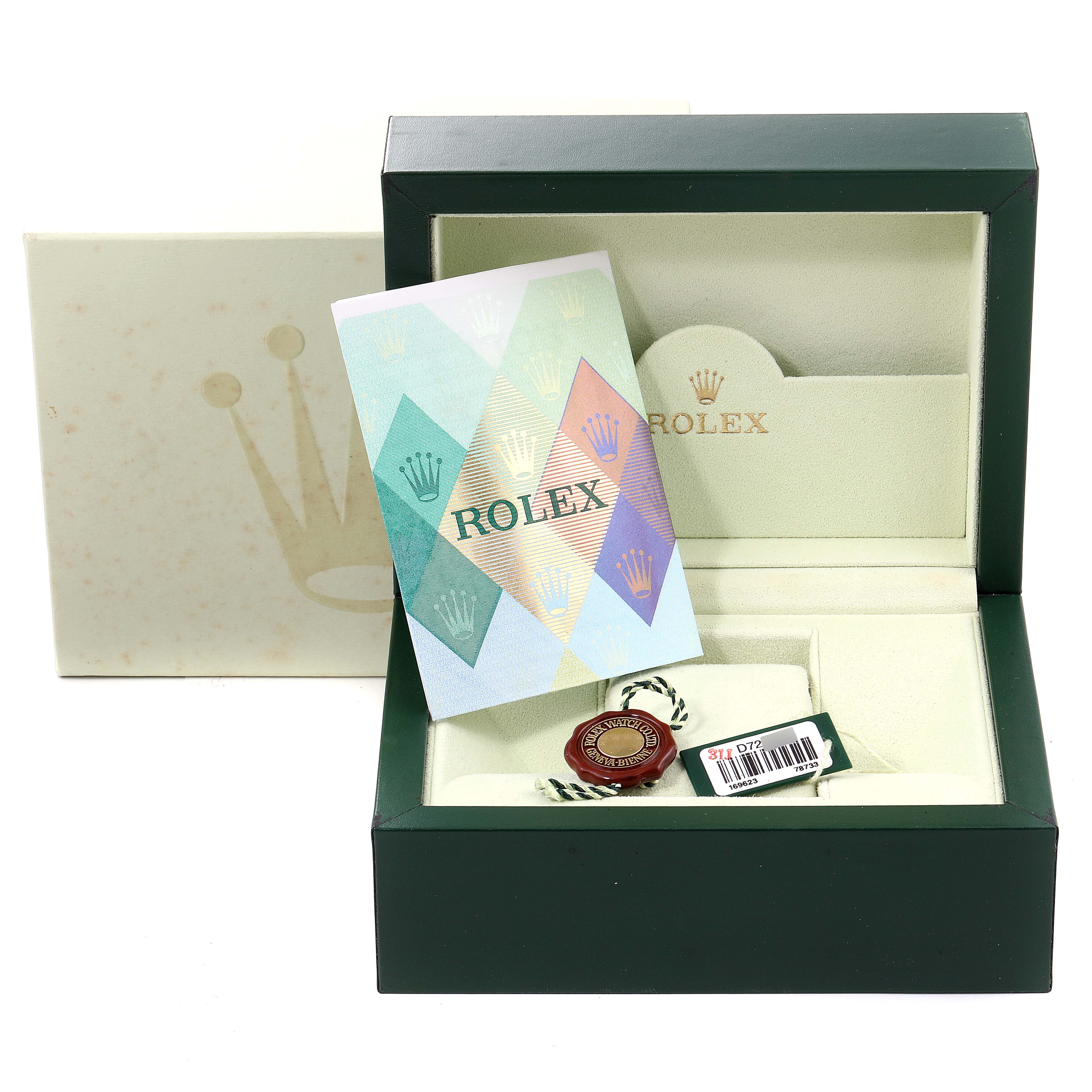 The image shows the open box of a Rolex Yacht-Master 169623 Women's Steel and Gold (two tone) White Dial 169623 Women's Steel and Gold (two tone) White Dial watch with a booklet and accessory tags visible.