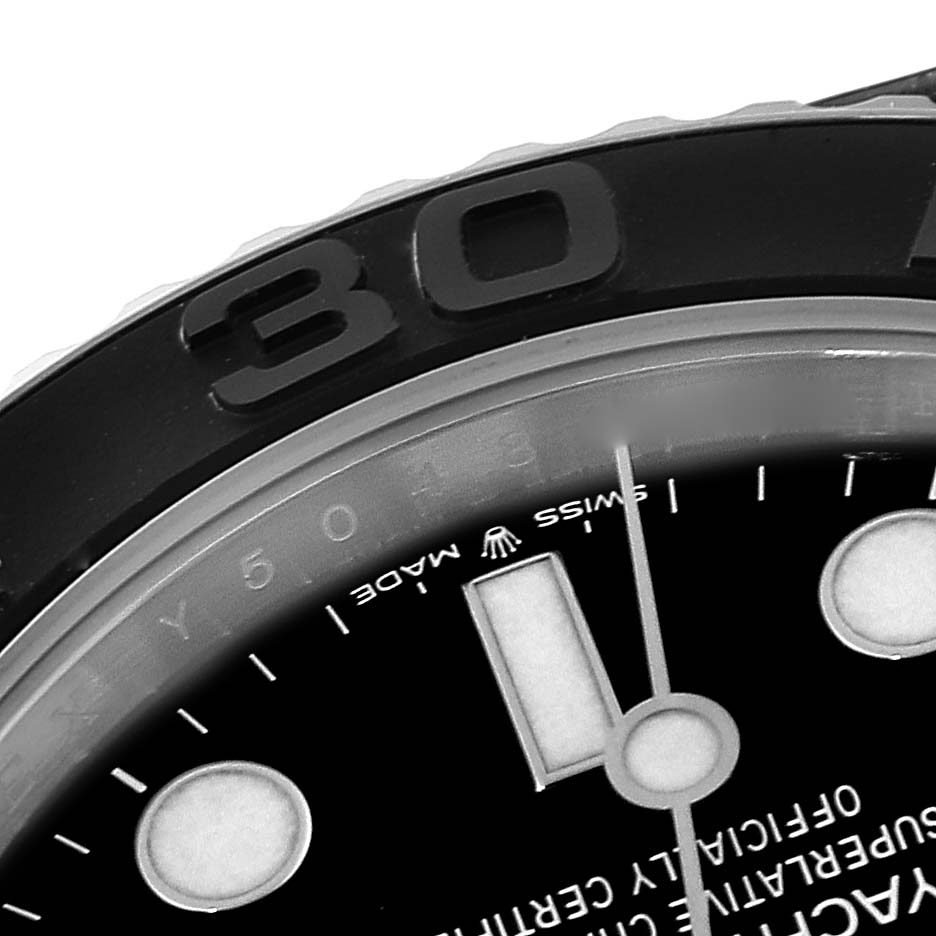 This image shows a close-up of the bezel and part of the dial of a Rolex Yacht-Master 226659 Men's White Gold Black Dial 226659 Men's White Gold Black Dial watch.
