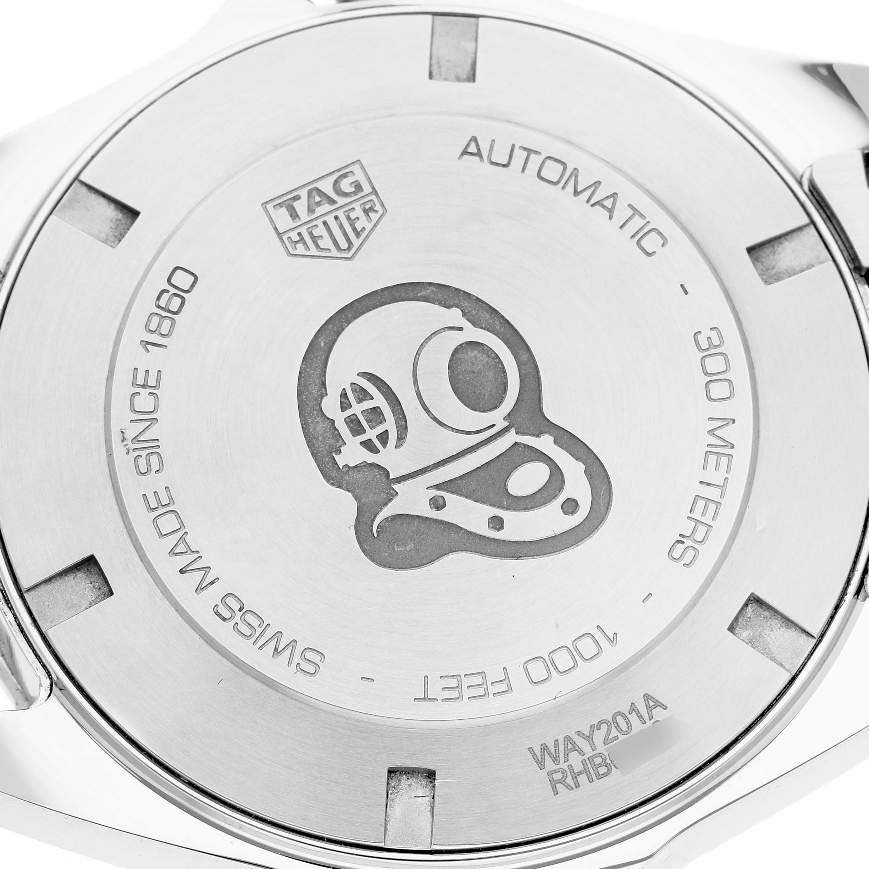 The image shows the back case of a Tag Heuer Aquaracer WAY201A.BA0927 Men's Stainless Steel Black Dial WAY201A.BA0927 Men's Stainless Steel Black Dial watch with engraved details.