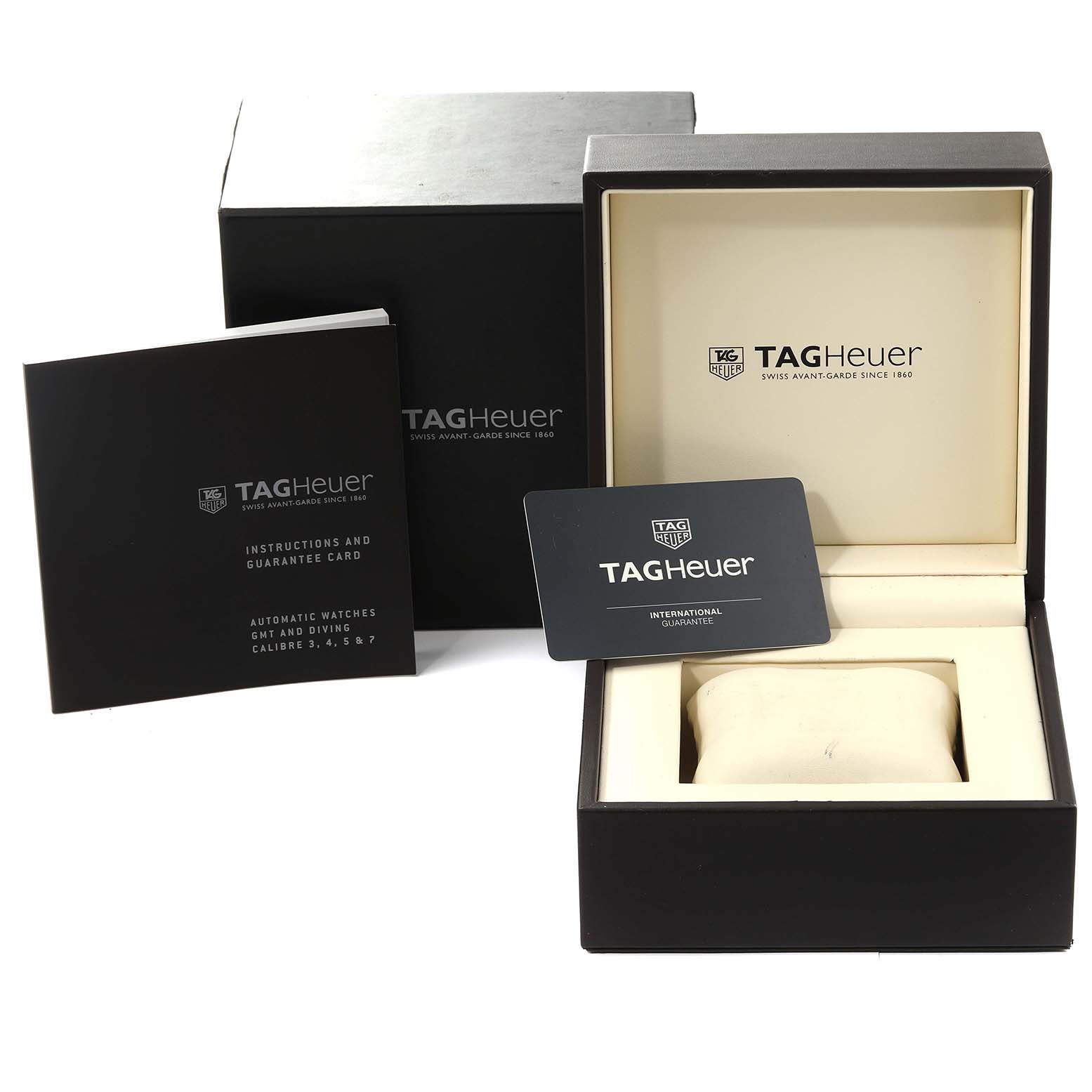 The image shows the packaging box, instruction manual, and guarantee card for a Tag Heuer Aquaracer WAY201A.BA0927 Men's Stainless Steel Black Dial WAY201A.BA0927 Men's Stainless Steel Black Dial watch.