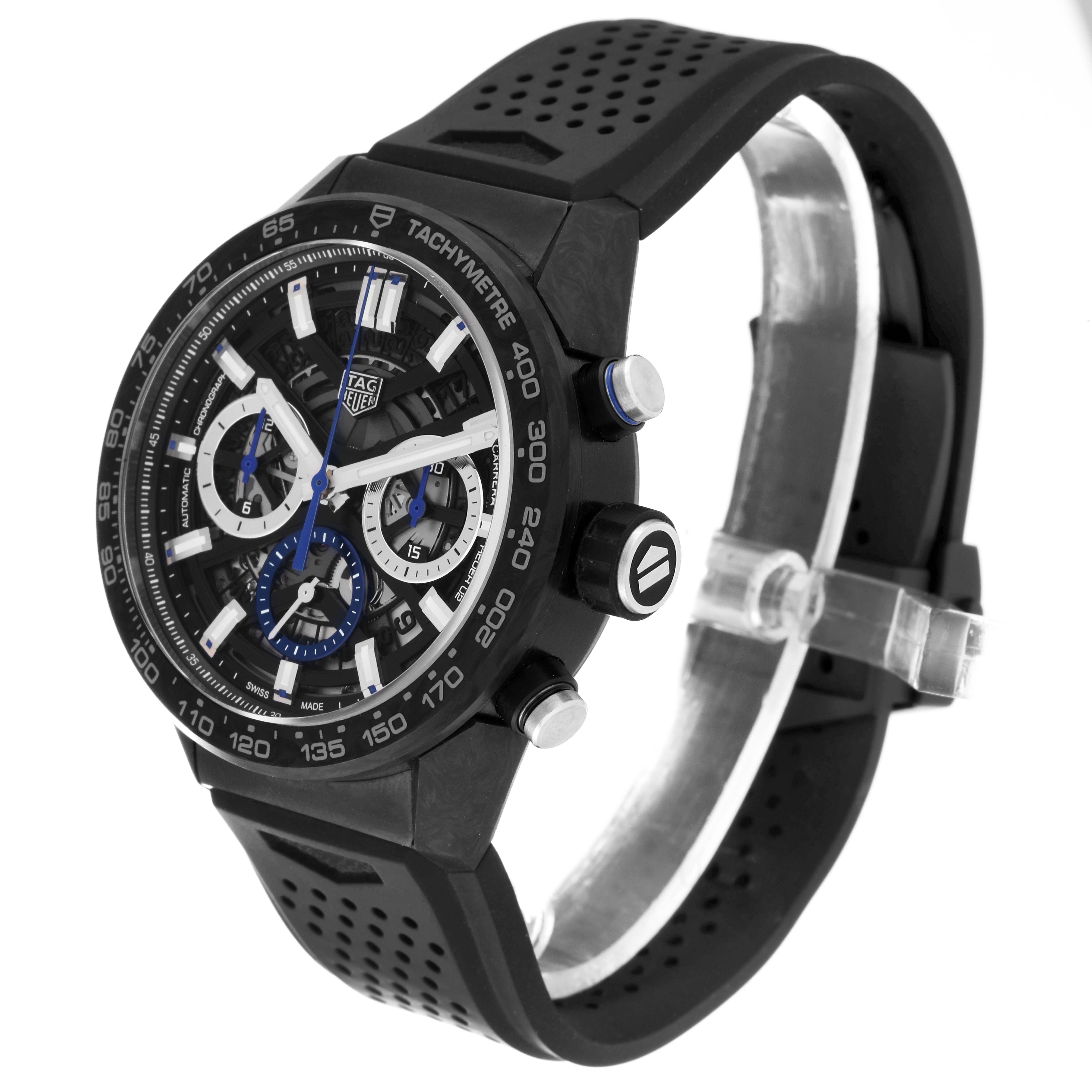 The image shows a side-angle view of the Tag Heuer Carrera watch, highlighting the face, crown, and chronograph pushers.