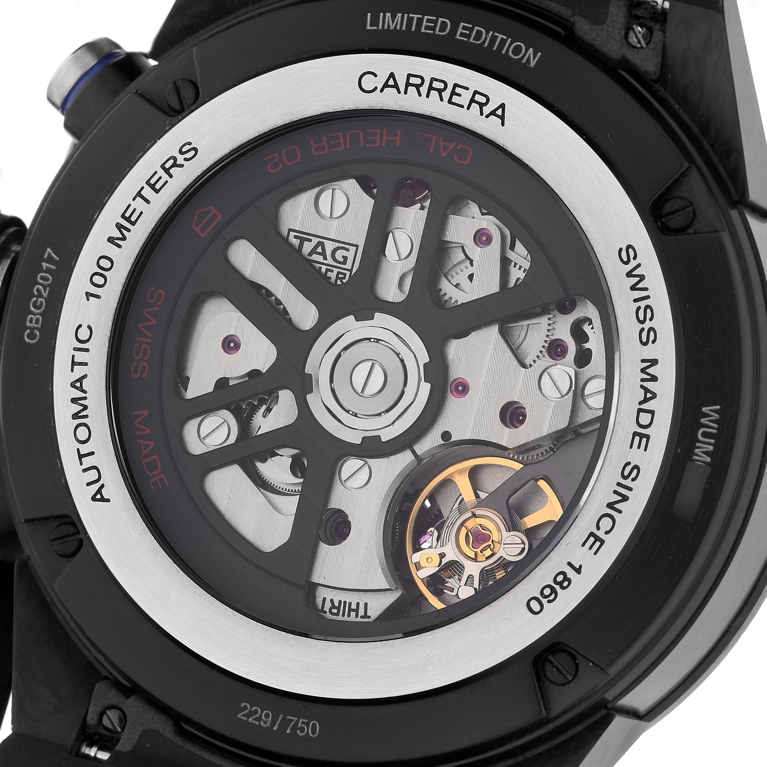 The image shows the back view of the Tag Heuer Carrera watch, highlighting its mechanical movement and inscriptions.