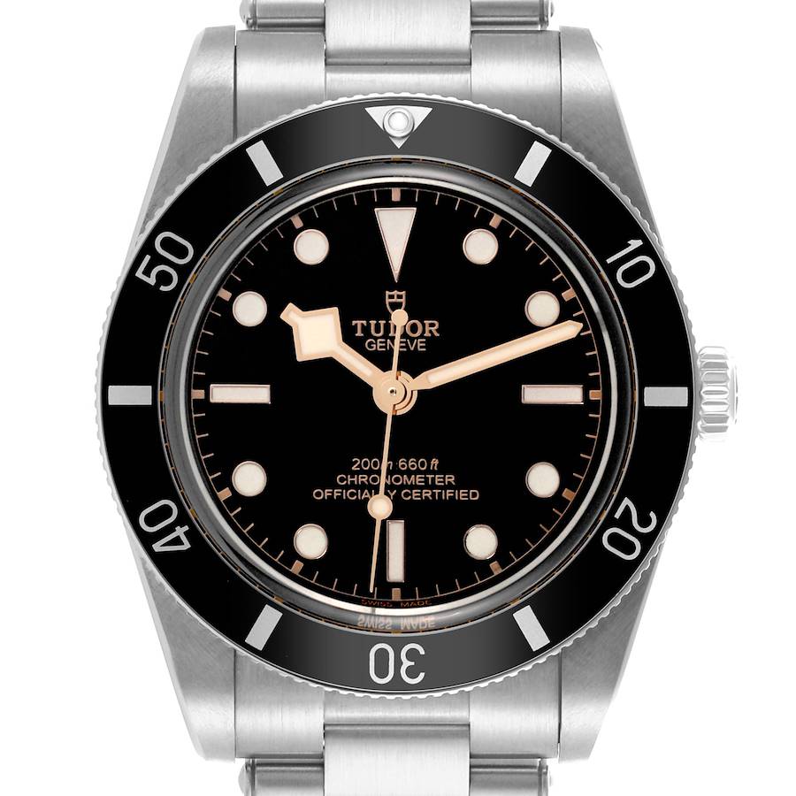 The Tudor Heritage Black Bay watch is shown from a front view, highlighting the dial, bezel, and part of the bracelet.