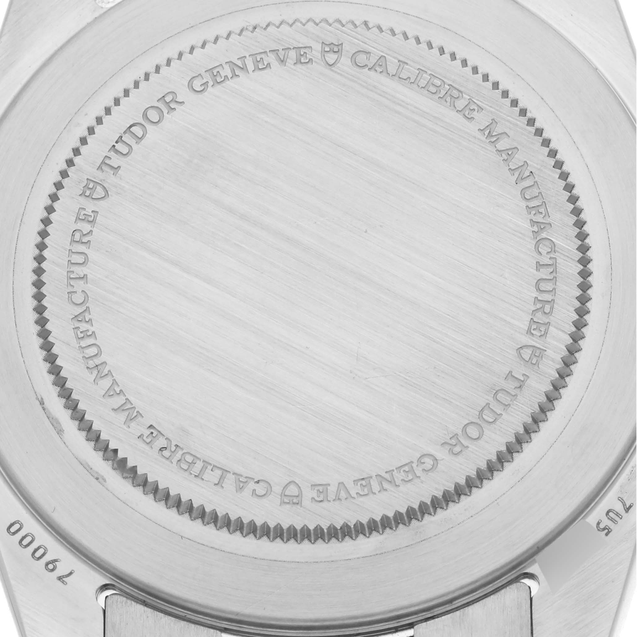 The image shows the back case of the Tudor Heritage Black Bay M79000N-0001 Men's Stainless Steel Black Dial M79000N-0001 Men's Stainless Steel Black Dial watch, highlighting the engraved details.