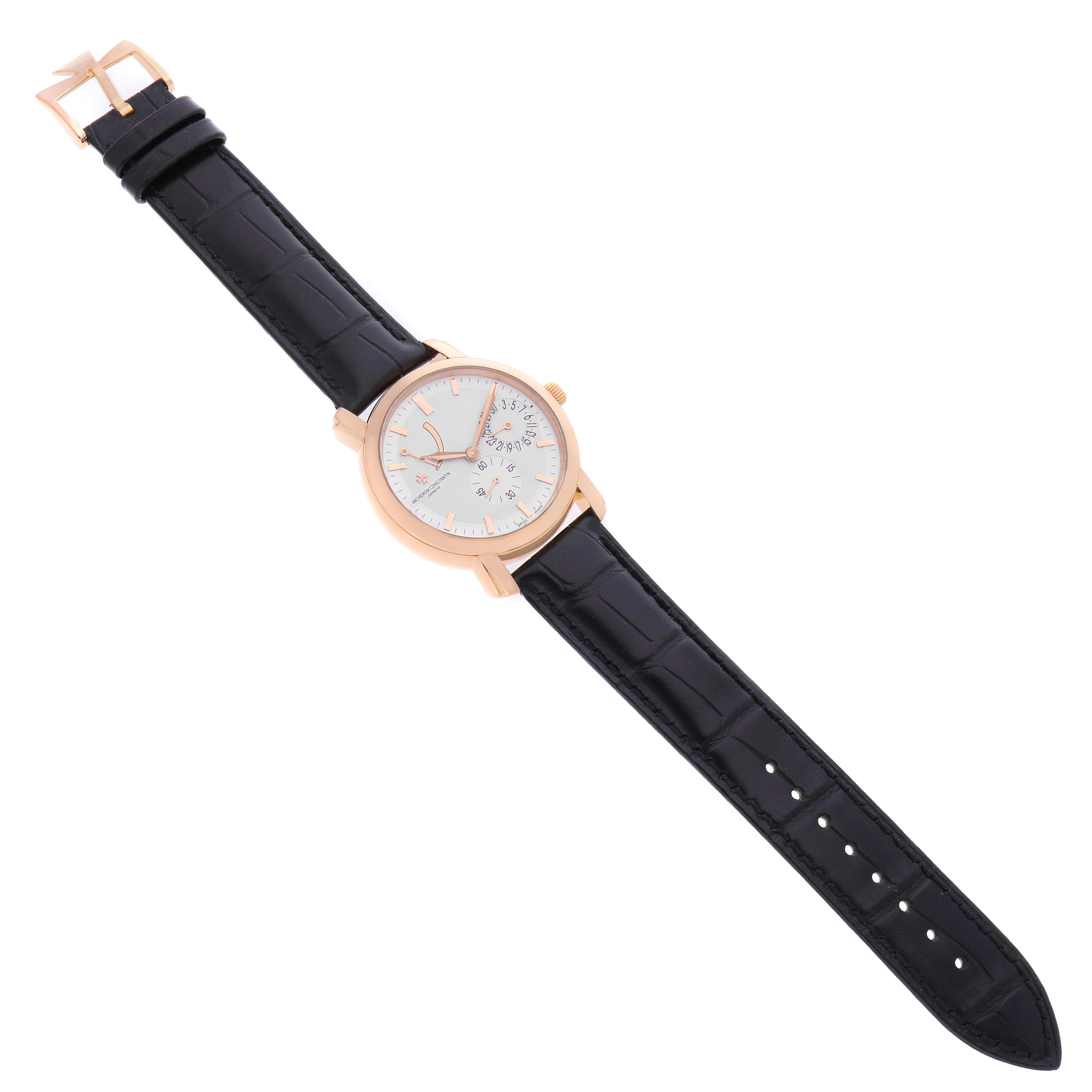 The Vacheron Constantin Malte 83060 Men's Rose Gold Silver Dial watch is shown from a top-down angle, displaying its round case, black leather strap, and gold buckle.