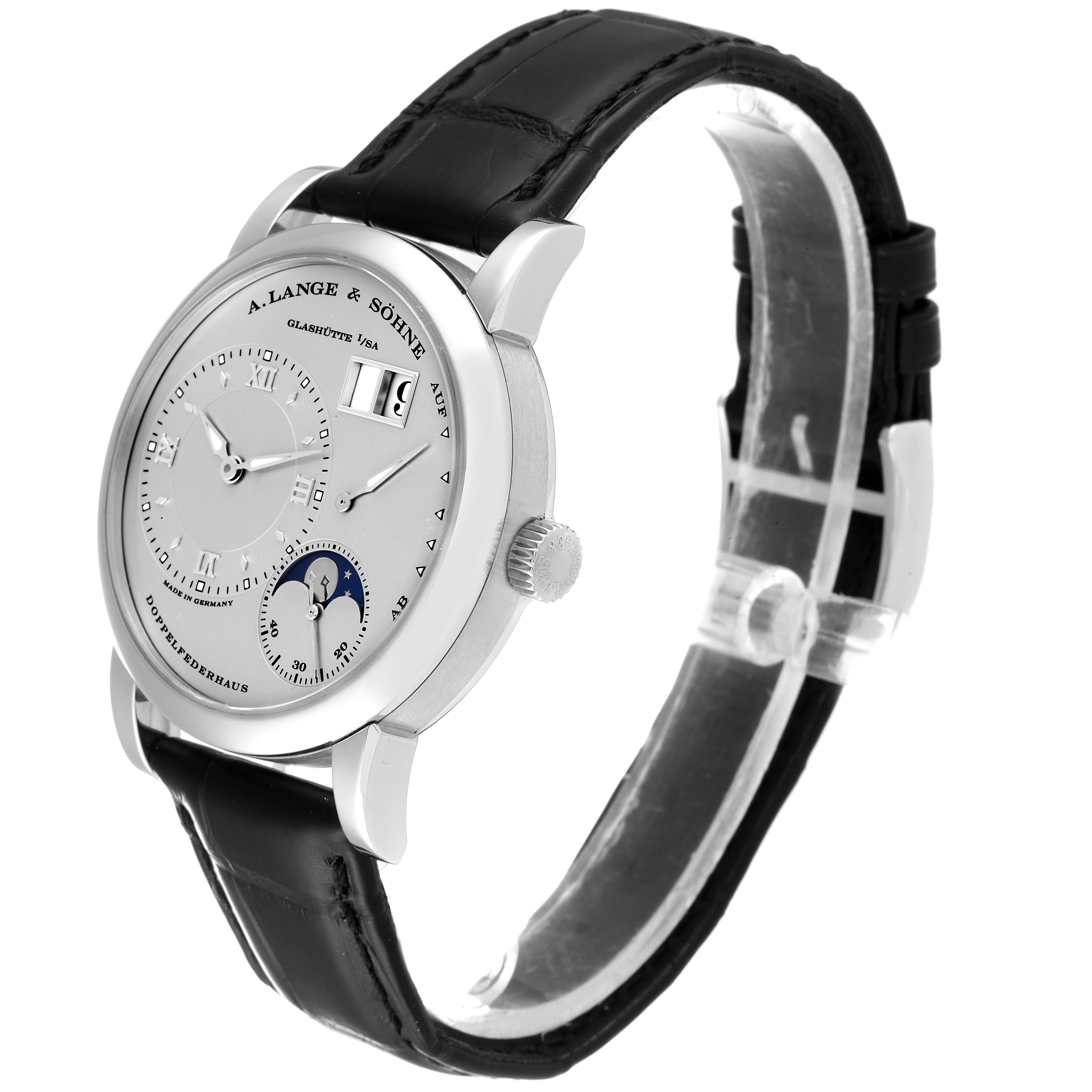 The photo shows the Lange 1 model by A. Lange & Söhne from a left-front angle, highlighting its dial, case, and black strap.