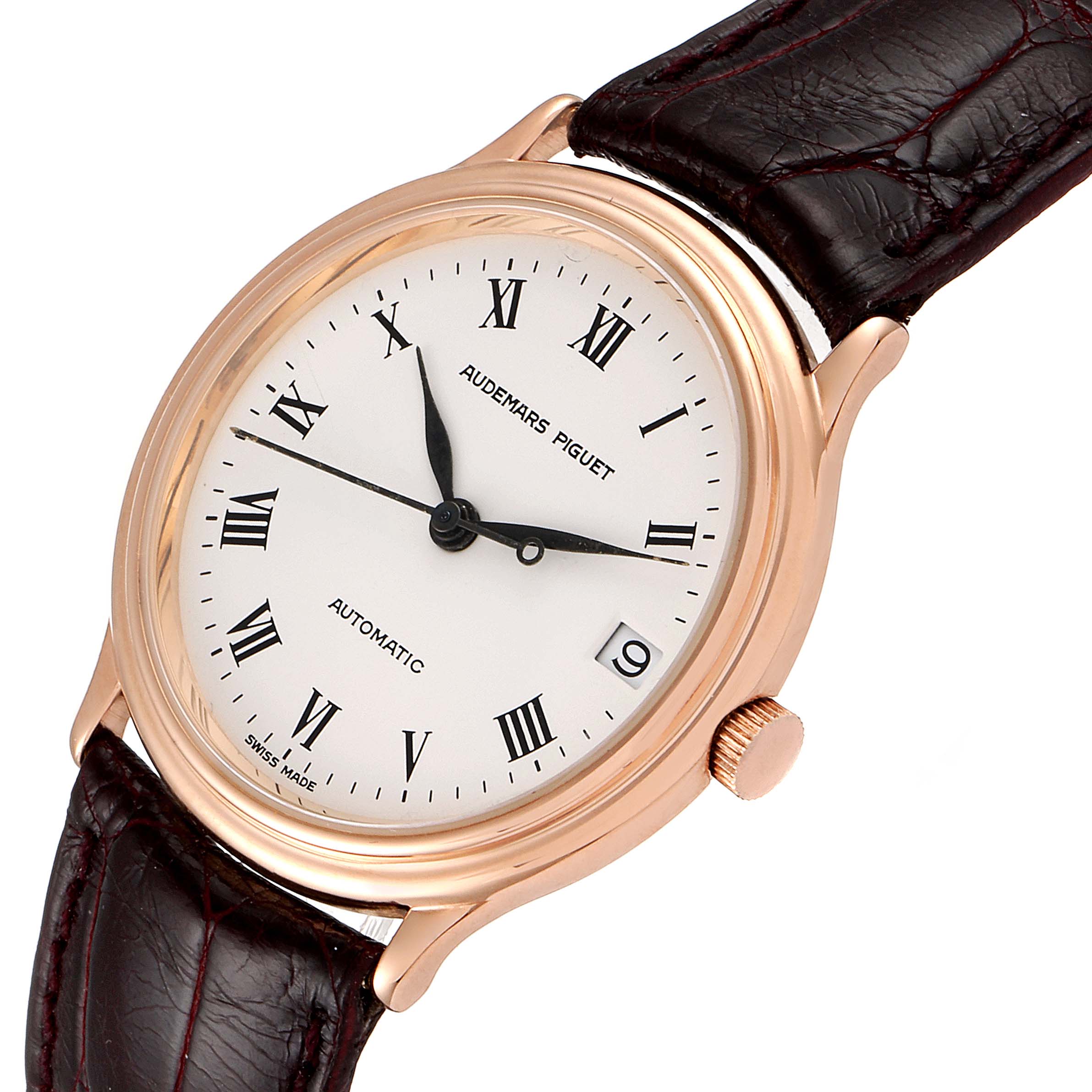 This image shows a Vintage Audemars Piguet watch at a slight angle, highlighting the dial, Roman numerals, date window, and leather strap.