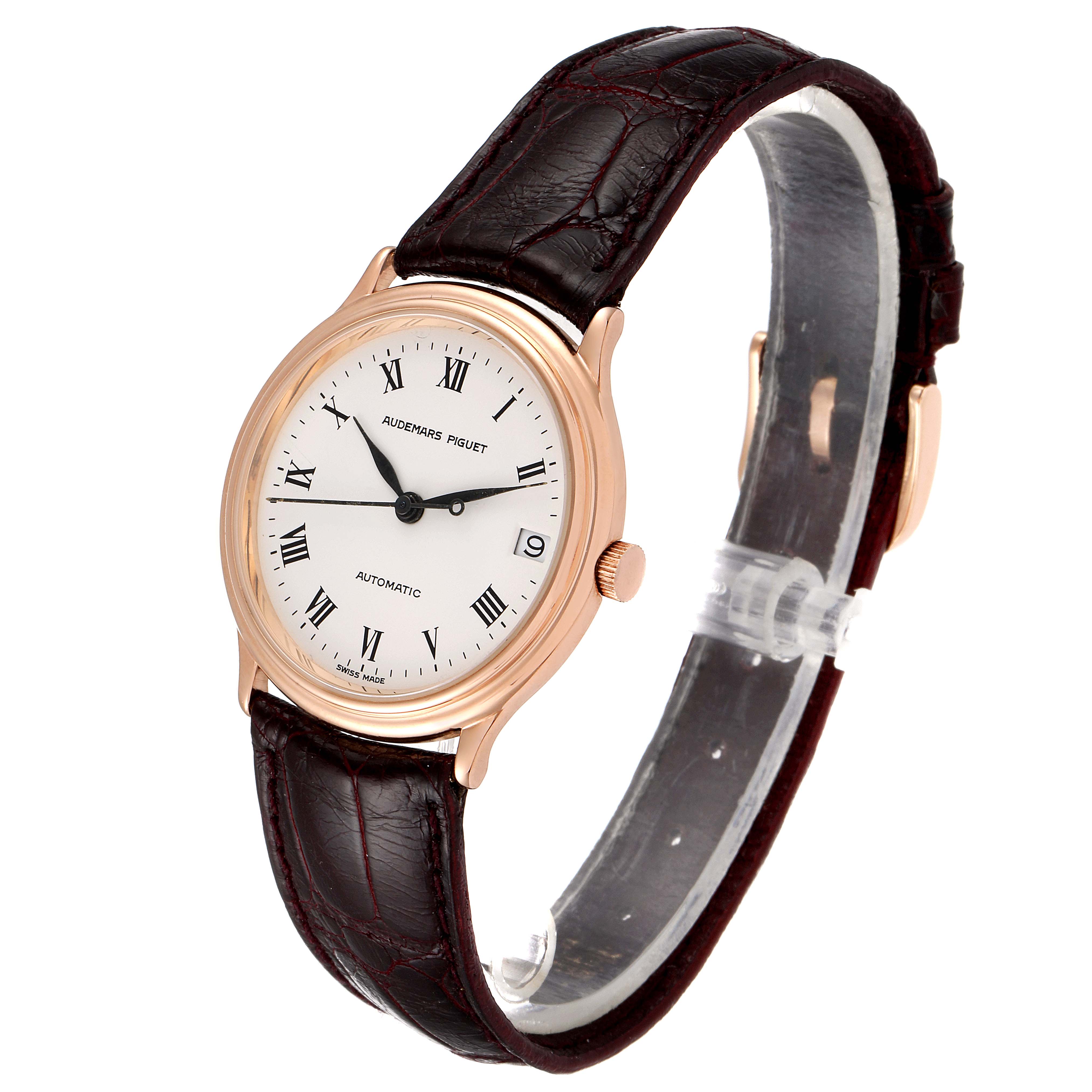 The Audemars Piguet Vintage 14406BA.PP.0002X Men's Rose Gold White Dial 14406BA.PP.0002X Men's Rose Gold White Dial model watch is displayed at a three-quarter angle, highlighting the face, leather strap, and crown.