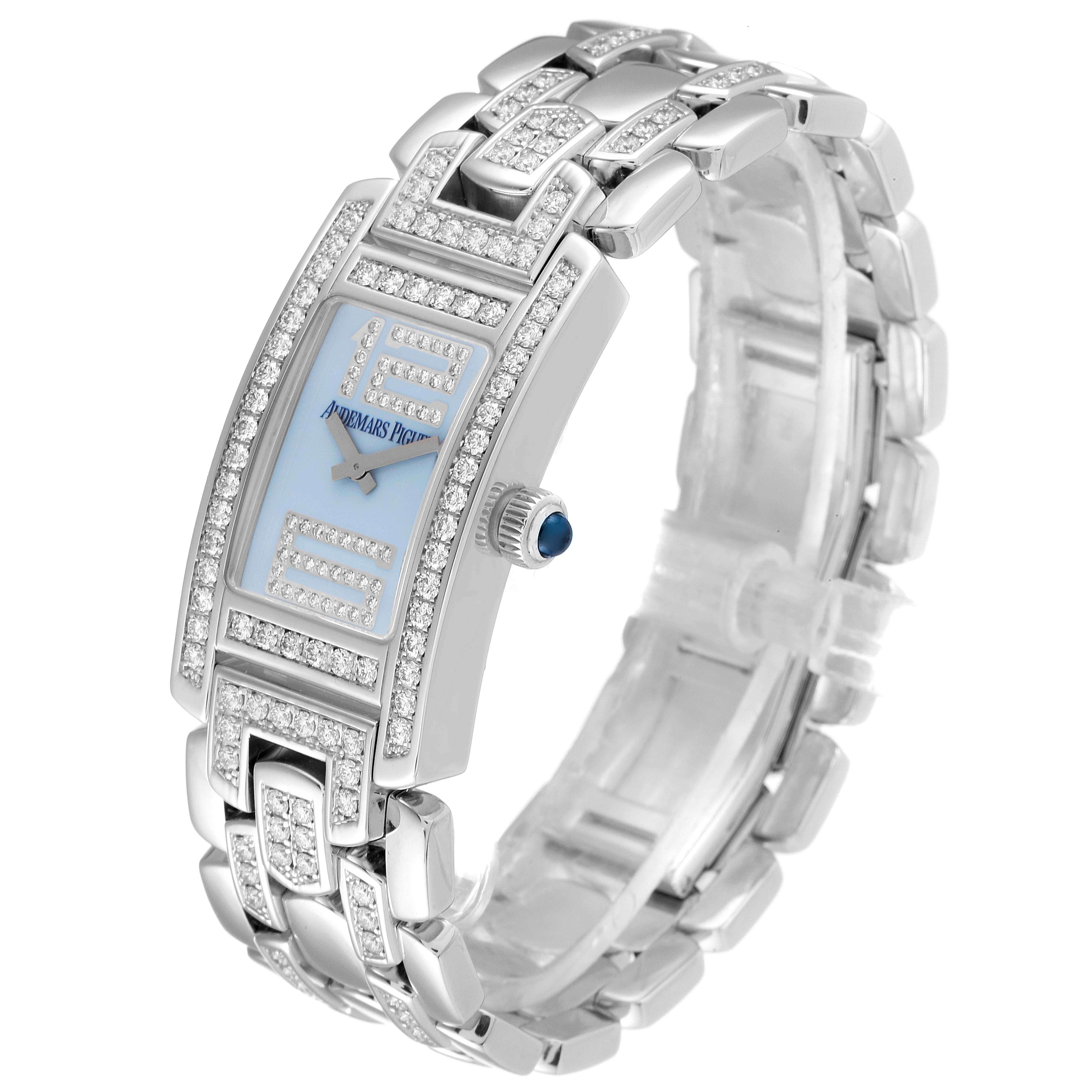 This image shows a vintage Audemars Piguet watch from an angled side view, highlighting its diamond-encrusted rectangular face and bracelet.