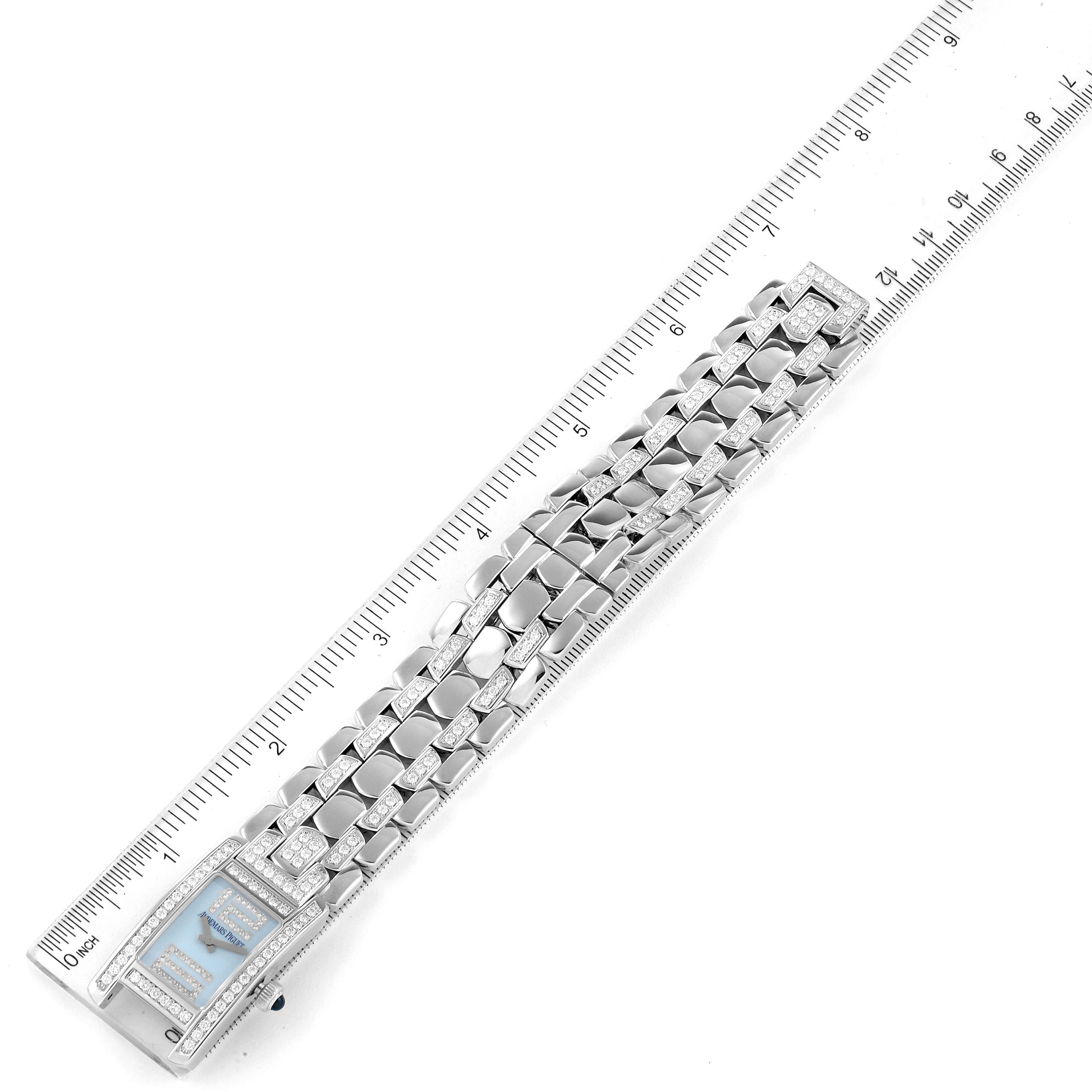 The image shows a top-down view of a Vintage Audemars Piguet watch, highlighting its bracelet and partial face alongside a ruler.